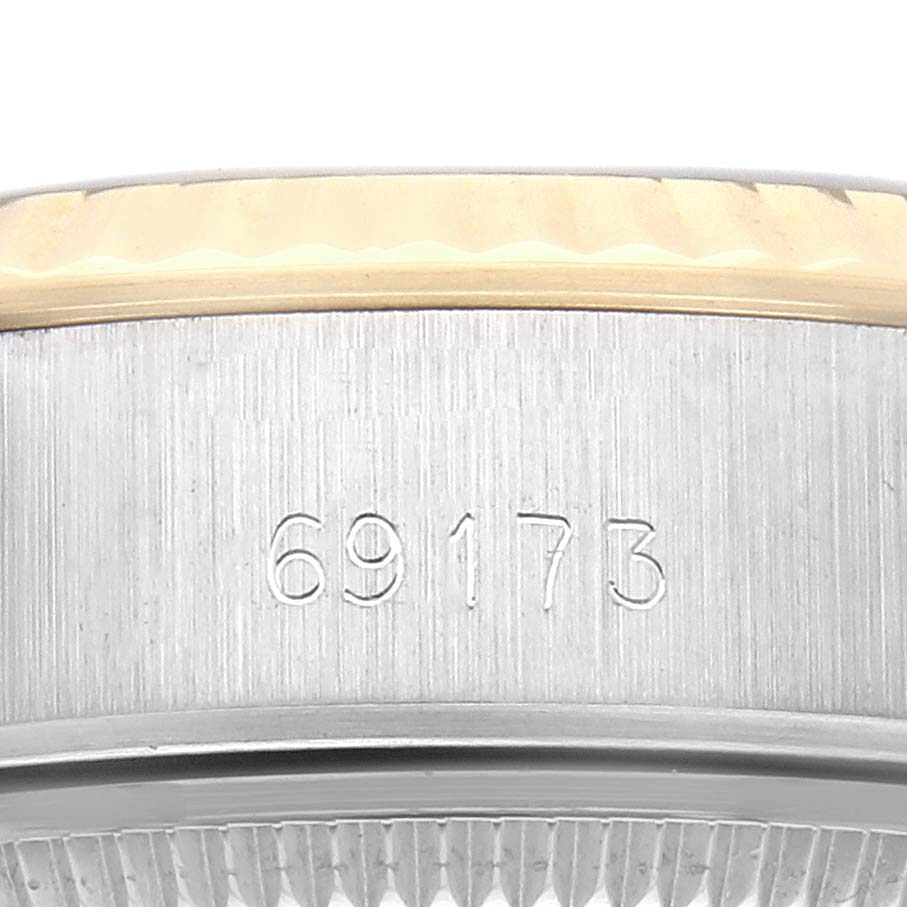 The image shows a side view of the Rolex Datejust 69173 Women's Steel and Gold (two tone) Black Dial 69173 Women's Steel and Gold (two tone) Black Dial watch case, highlighting the reference number "69173" engraved on the side beneath the bezel.