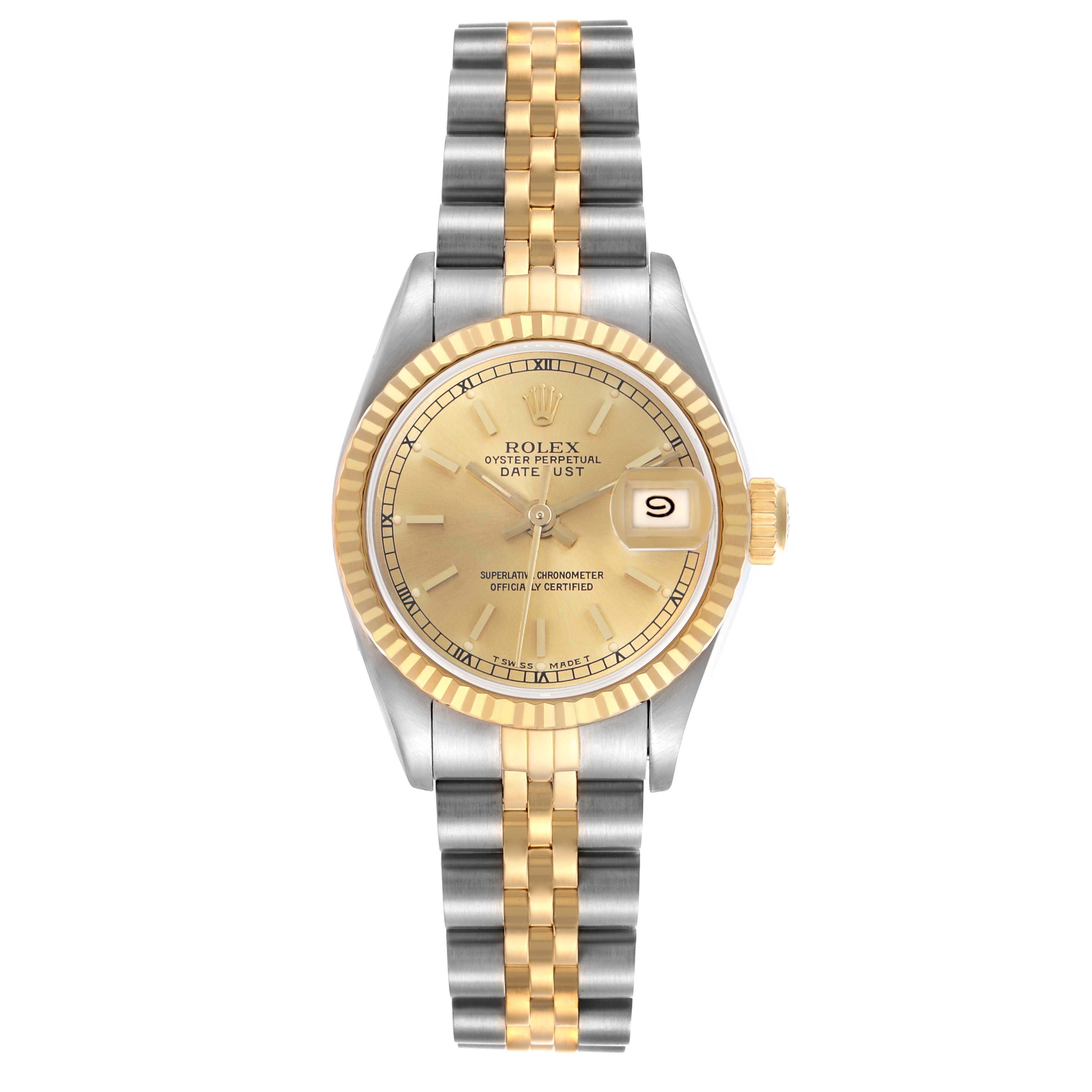 The Rolex Datejust 69173 Women's Steel and Gold (two tone) Champagne Dial 69173 Women's Steel and Gold (two tone) Champagne Dial watch is shown from a top-down angle, highlighting its gold dial, fluted bezel, and two-tone bracelet.