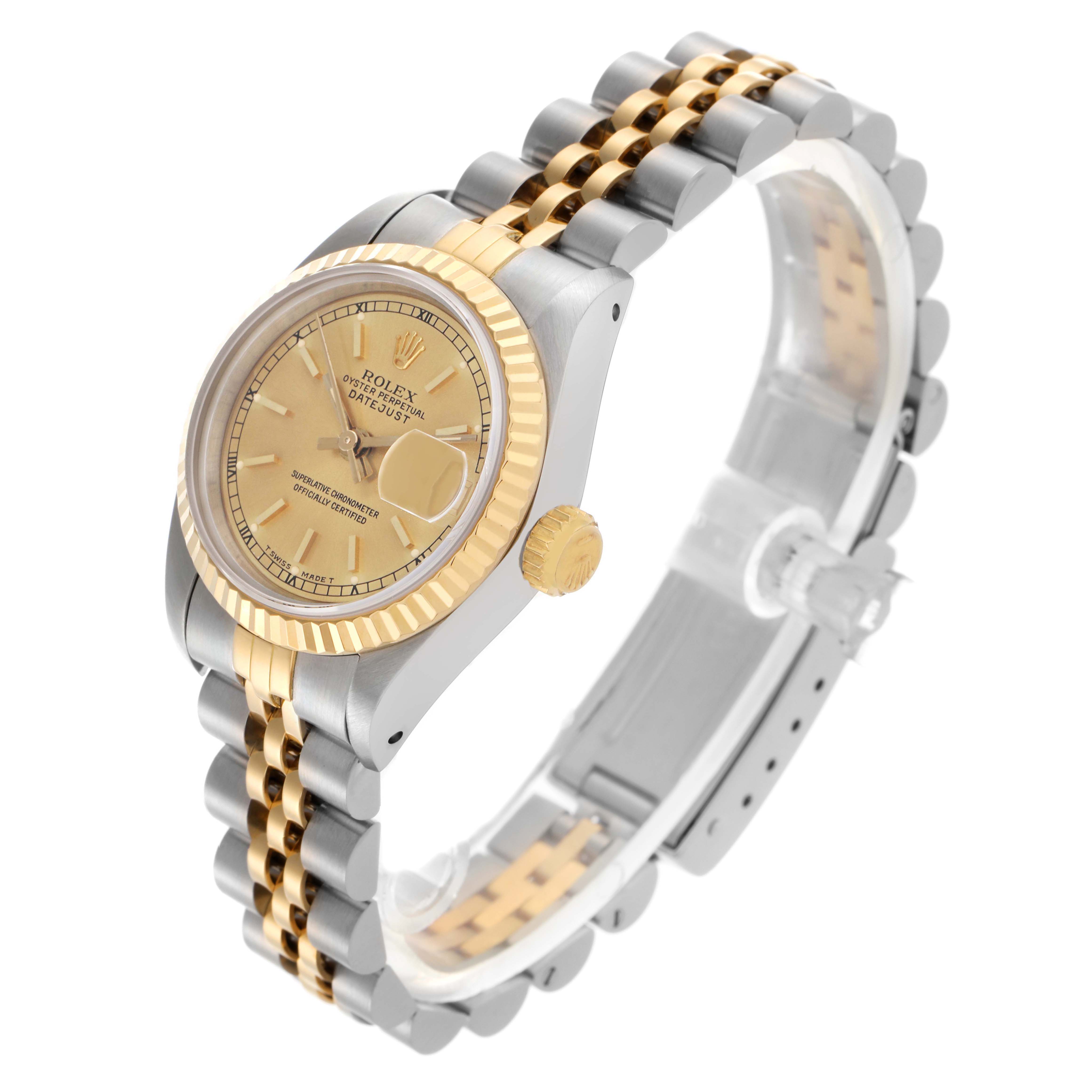 The Rolex Datejust 69173 Women's Steel and Gold (two tone) Champagne Dial 69173 Women's Steel and Gold (two tone) Champagne Dial watch is shown at an angled side view, highlighting the dial, fluted bezel, and two-tone bracelet.