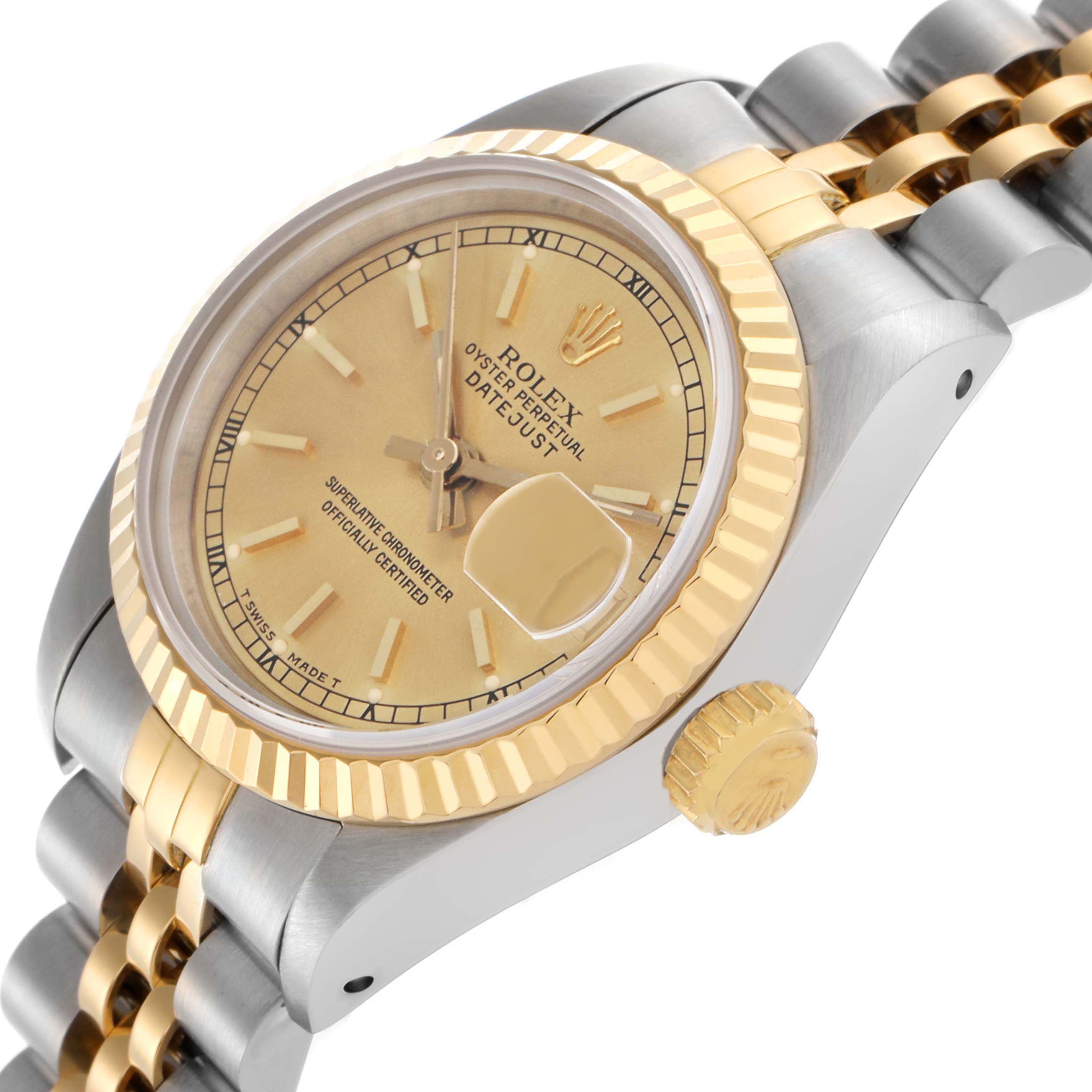 The Rolex Datejust 69173 Women's Steel and Gold (two tone) Champagne Dial 69173 Women's Steel and Gold (two tone) Champagne Dial watch is shown at an oblique angle displaying the dial, fluted bezel, crown, and part of the Jubilee bracelet.