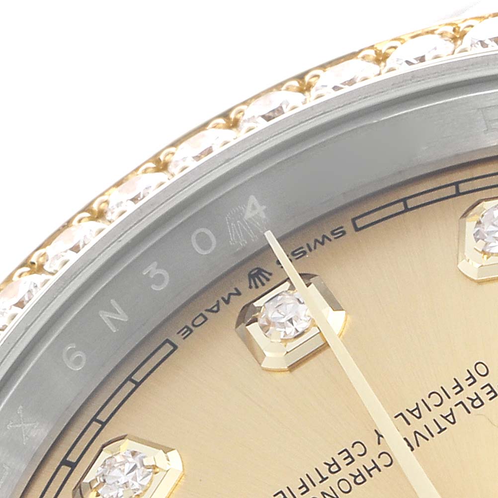 The image shows a close-up angle of a Rolex Datejust 126283 Men's Steel and Gold (two tone) Champagne Dial 126283 Men's Steel and Gold (two tone) Champagne Dial, focusing on the dial, bezel, and diamond hour markers.