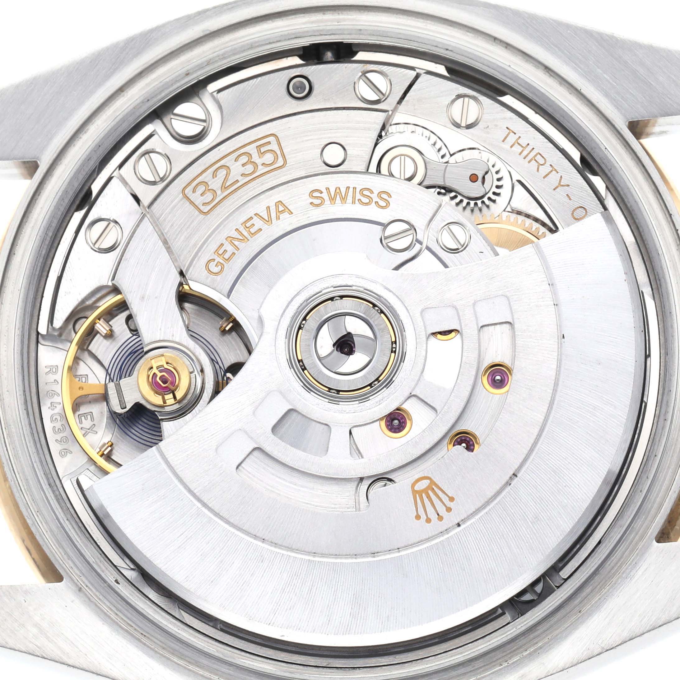 The image shows the movement mechanism of a Rolex Datejust 126283 Men's Steel and Gold (two tone) Champagne Dial 126283 Men's Steel and Gold (two tone) Champagne Dial watch from the back.