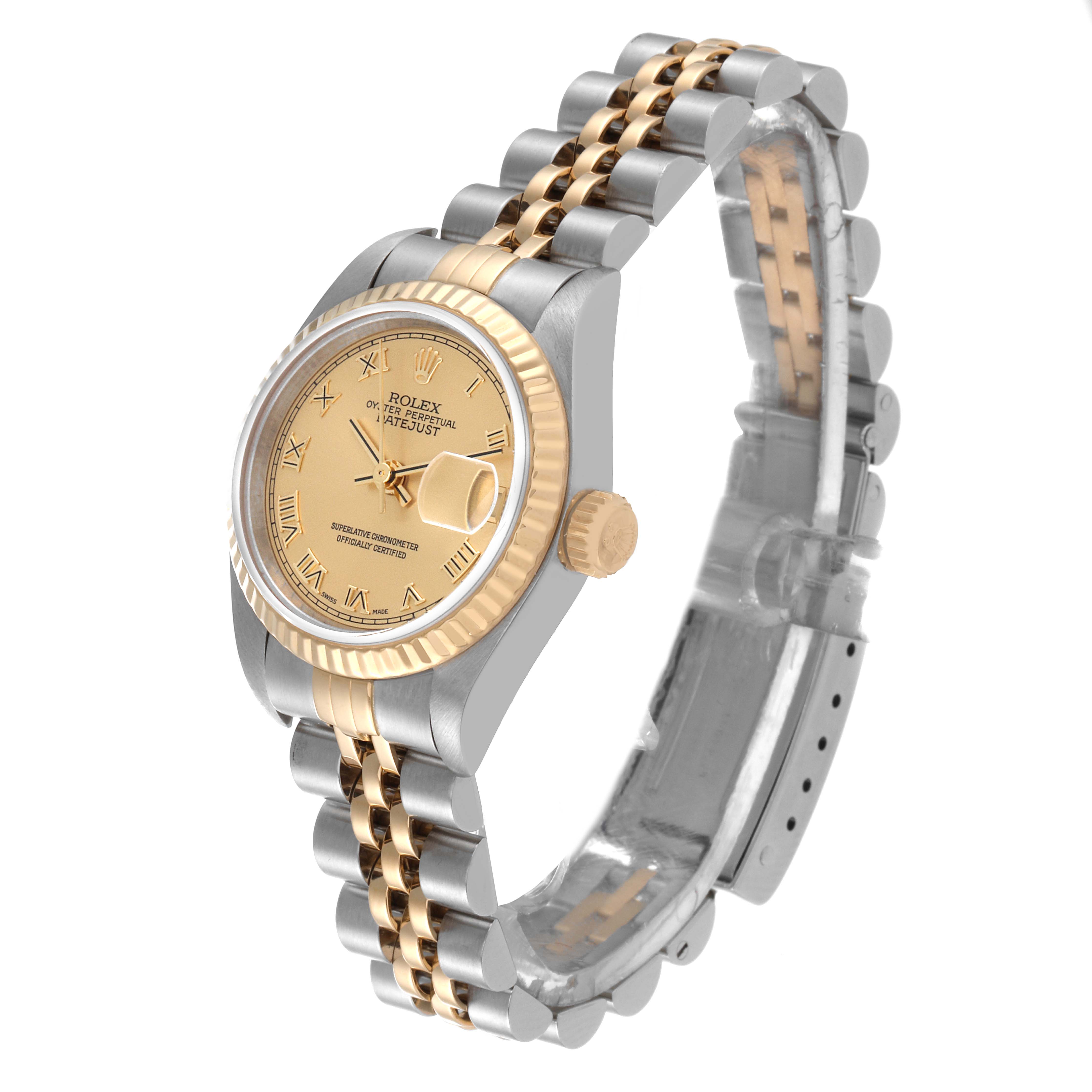 The Rolex Datejust 79173 Women's Steel and Gold (two tone) Champagne Dial 79173 Women's Steel and Gold (two tone) Champagne Dial watch is shown at an angle showcasing the face, bezel, crown, and the two-tone bracelet.