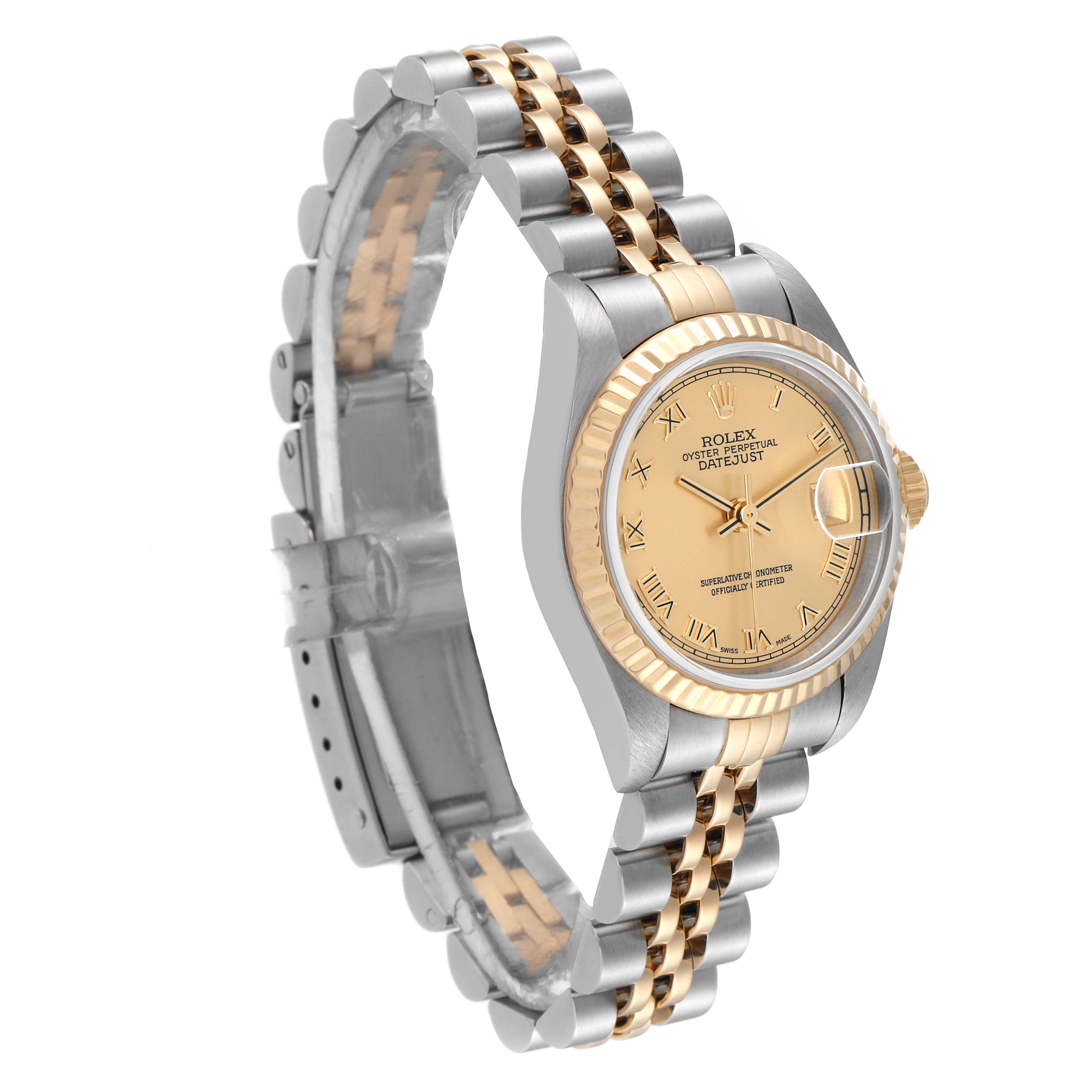 The image shows a Rolex Datejust 79173 Women's Steel and Gold (two tone) Champagne Dial 79173 Women's Steel and Gold (two tone) Champagne Dial watch at a three-quarter angle, highlighting its two-tone bracelet and fluted bezel.