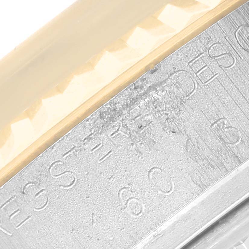 The image shows a close-up of the side engraving on a Vintage Collection Rolex watch, highlighting the model's details.