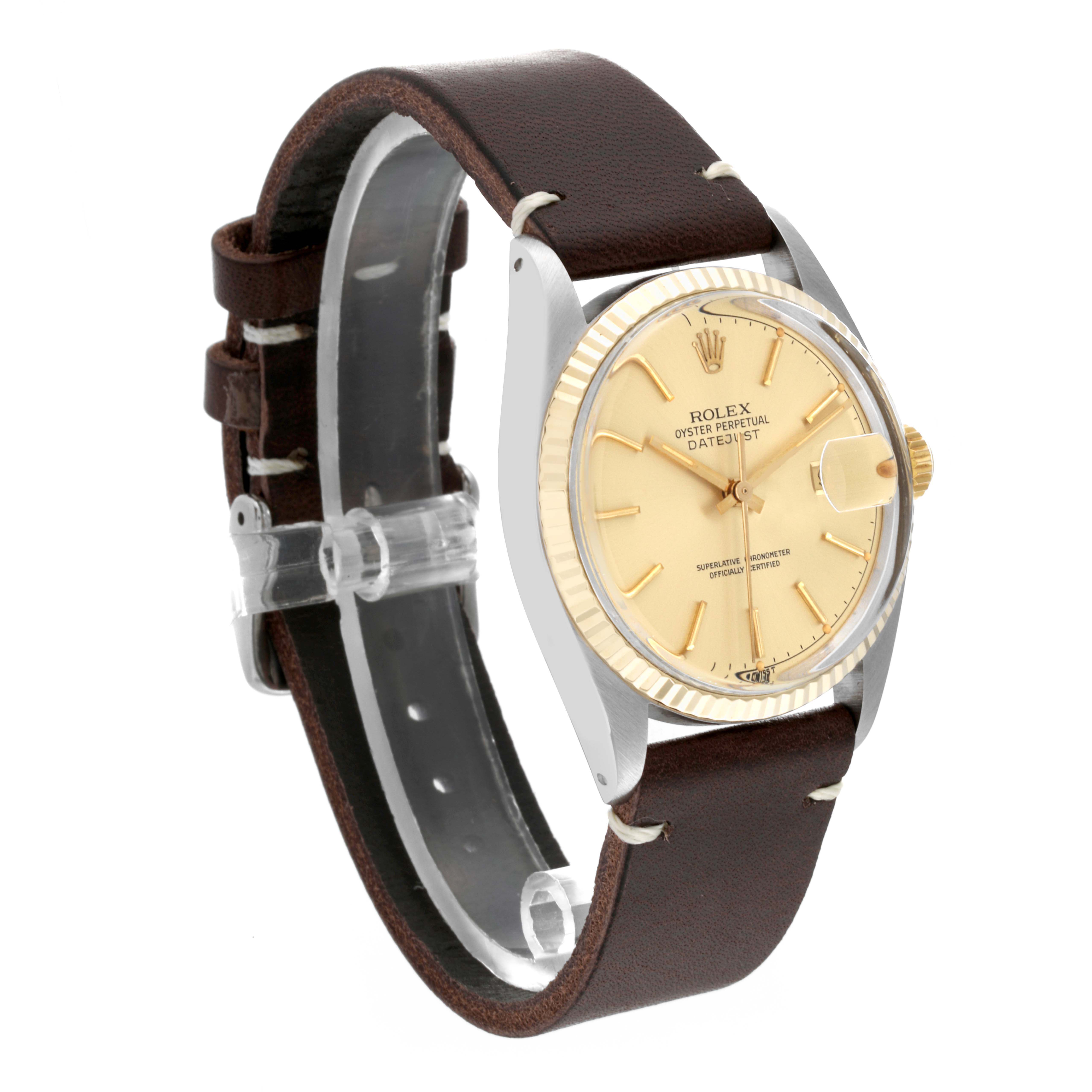 The Rolex Vintage Collection 16013 Men's Steel and Gold (two tone) Champagne Dial 16013 Men's Steel and Gold (two tone) Champagne Dial Datejust watch is shown at an angle displaying its face, bezel, and leather strap.