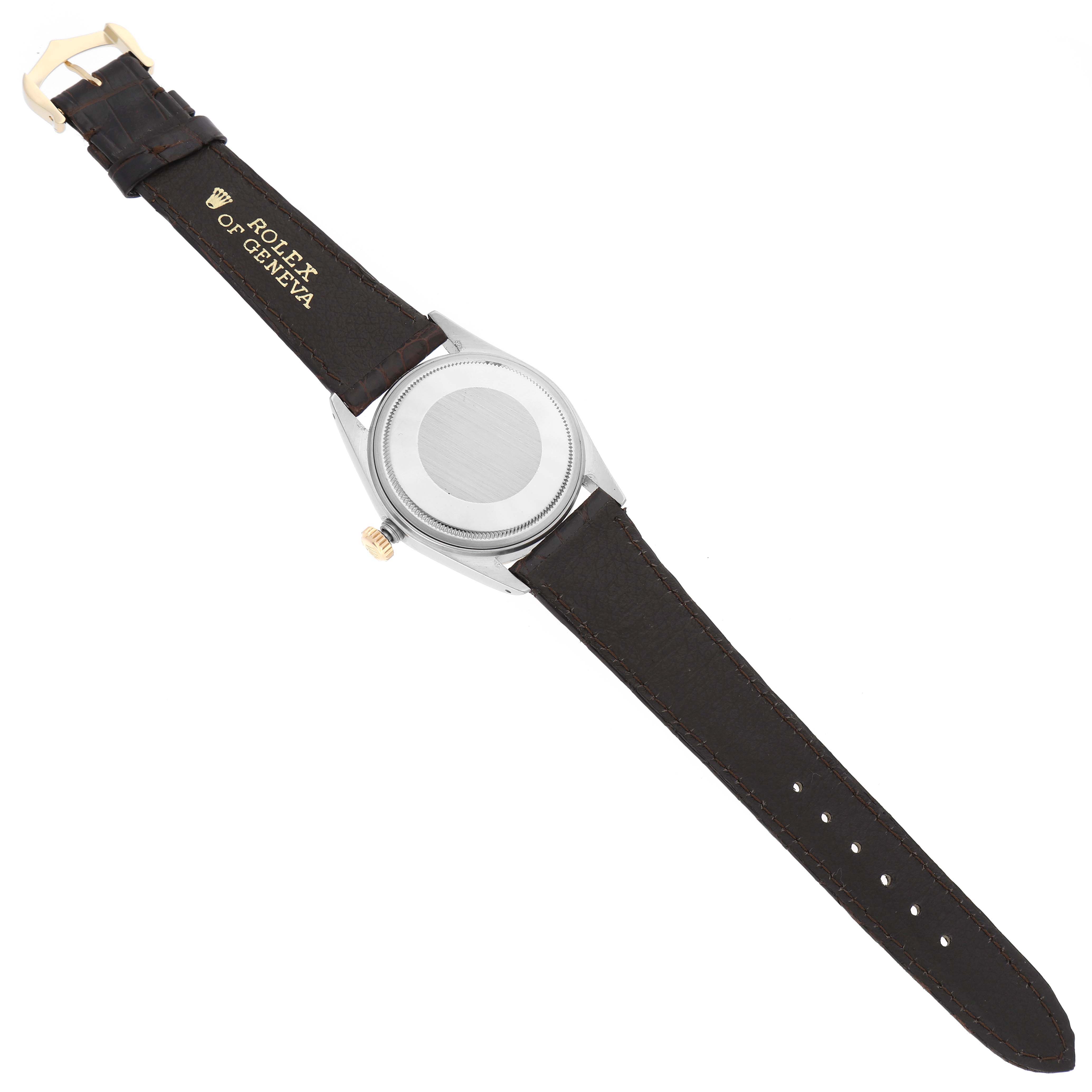 The image shows the back case and leather strap of a Vintage Collection Rolex watch.