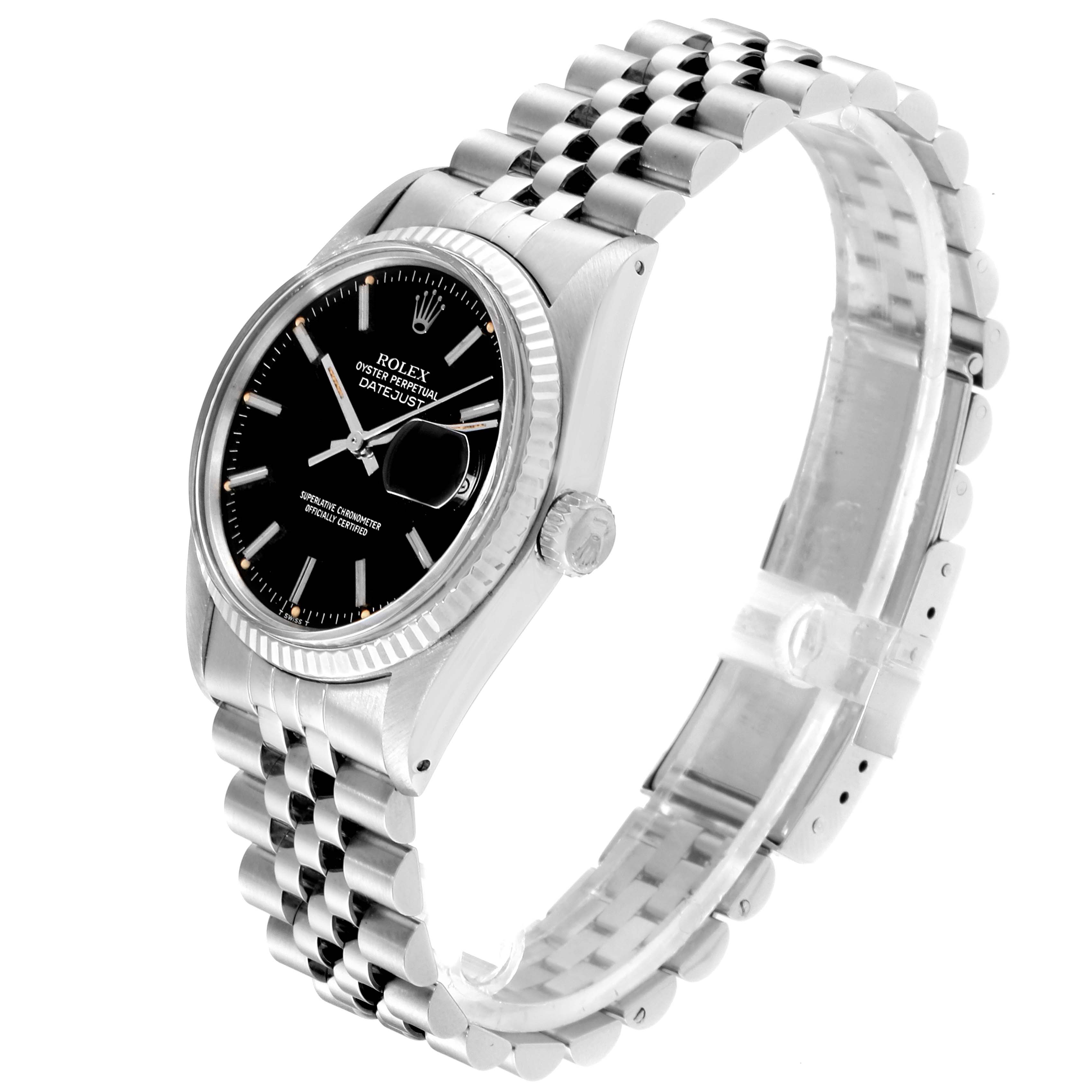 The image shows a Rolex Vintage Collection 16014 Men
s Stainless Steel Black Dial 16014 Men
s Stainless Steel Black Dial Datejust watch at a three-quarter angle, displaying the face, bezel, case, and bracelet.