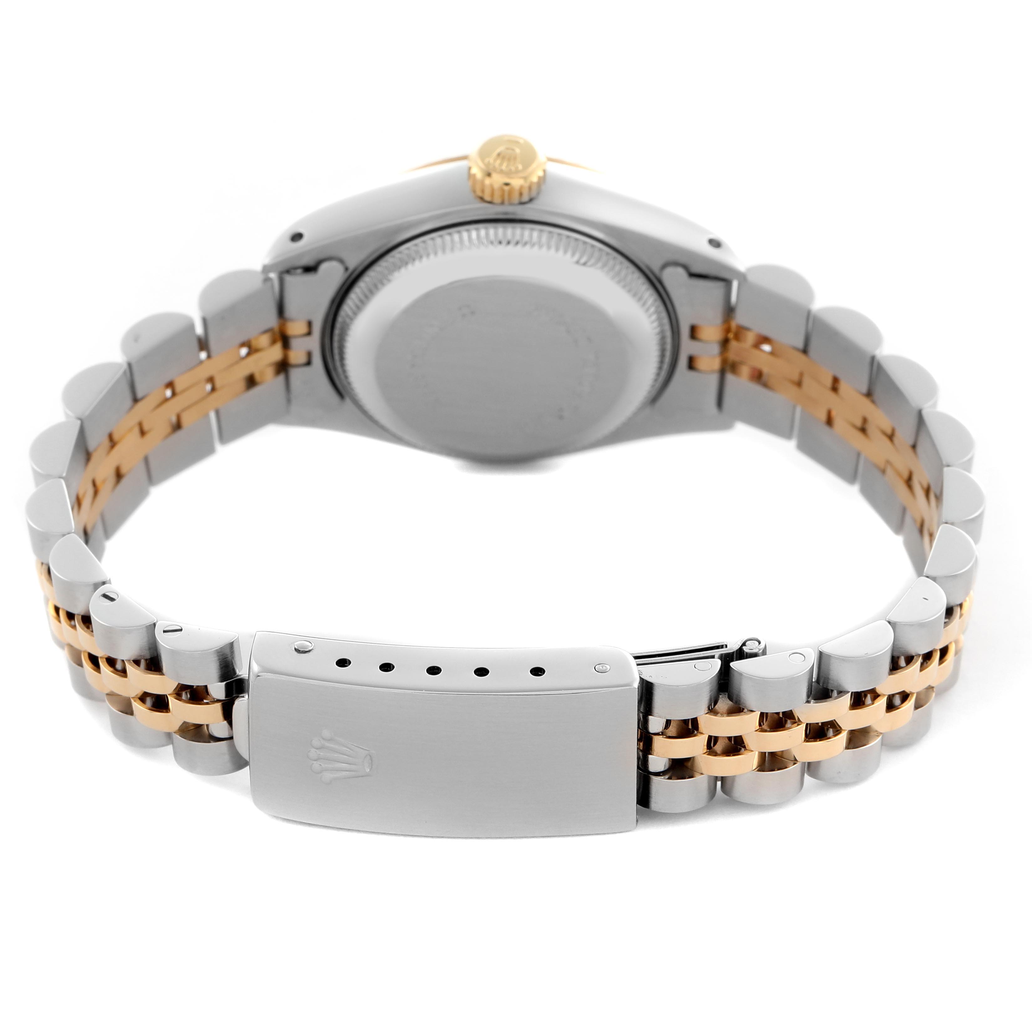 The Rolex Datejust 69173 Women's Steel and Gold (two tone) White Dial 69173 Women's Steel and Gold (two tone) White Dial watch is shown from the back with the case back, crown, and two-tone bracelet visible.