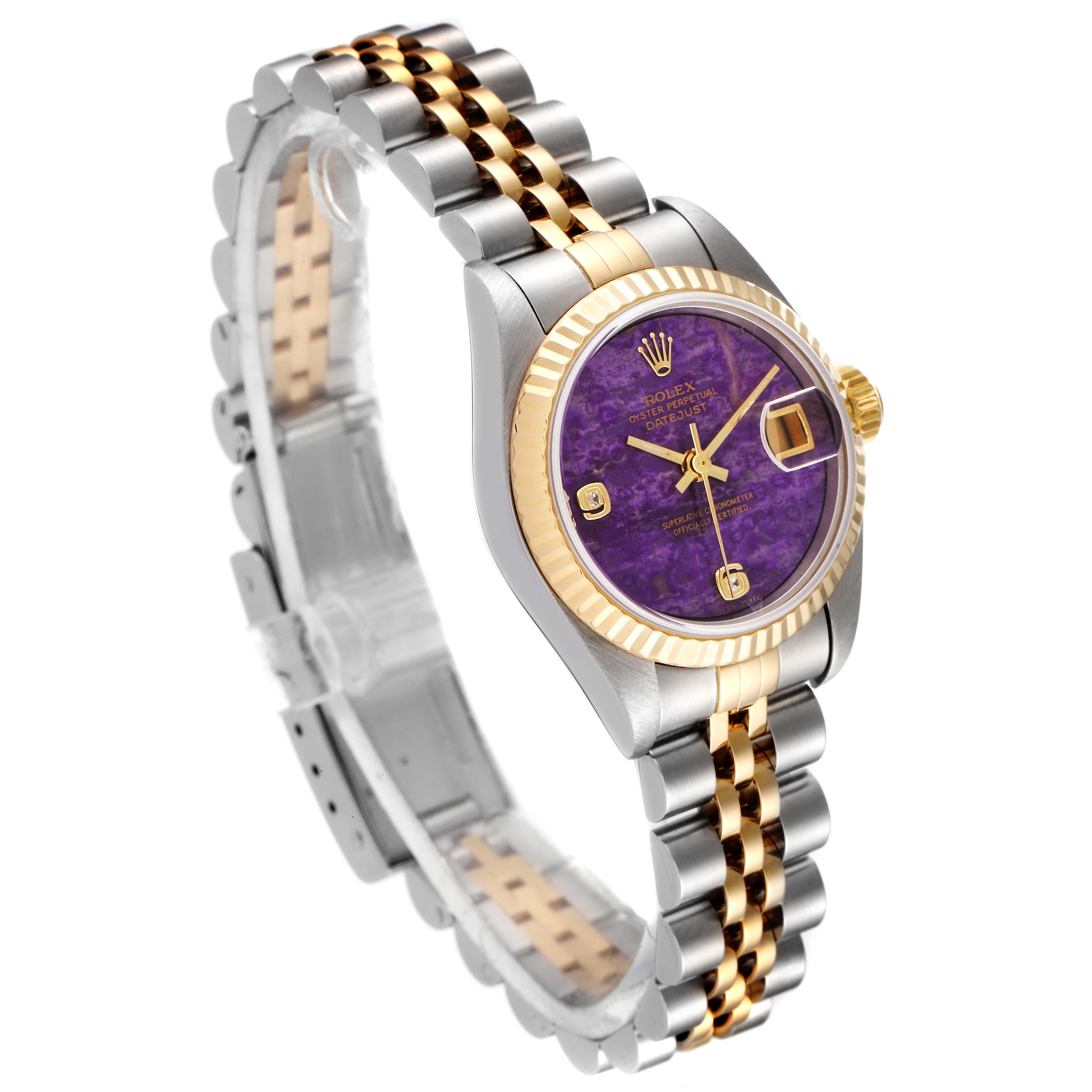 The Rolex Datejust 79173 Women's Steel and Gold (two tone) Purple Dial 79173 Women's Steel and Gold (two tone) Purple Dial watch is shown at an angled view featuring a purple dial, fluted bezel, and a two-tone Jubilee bracelet.