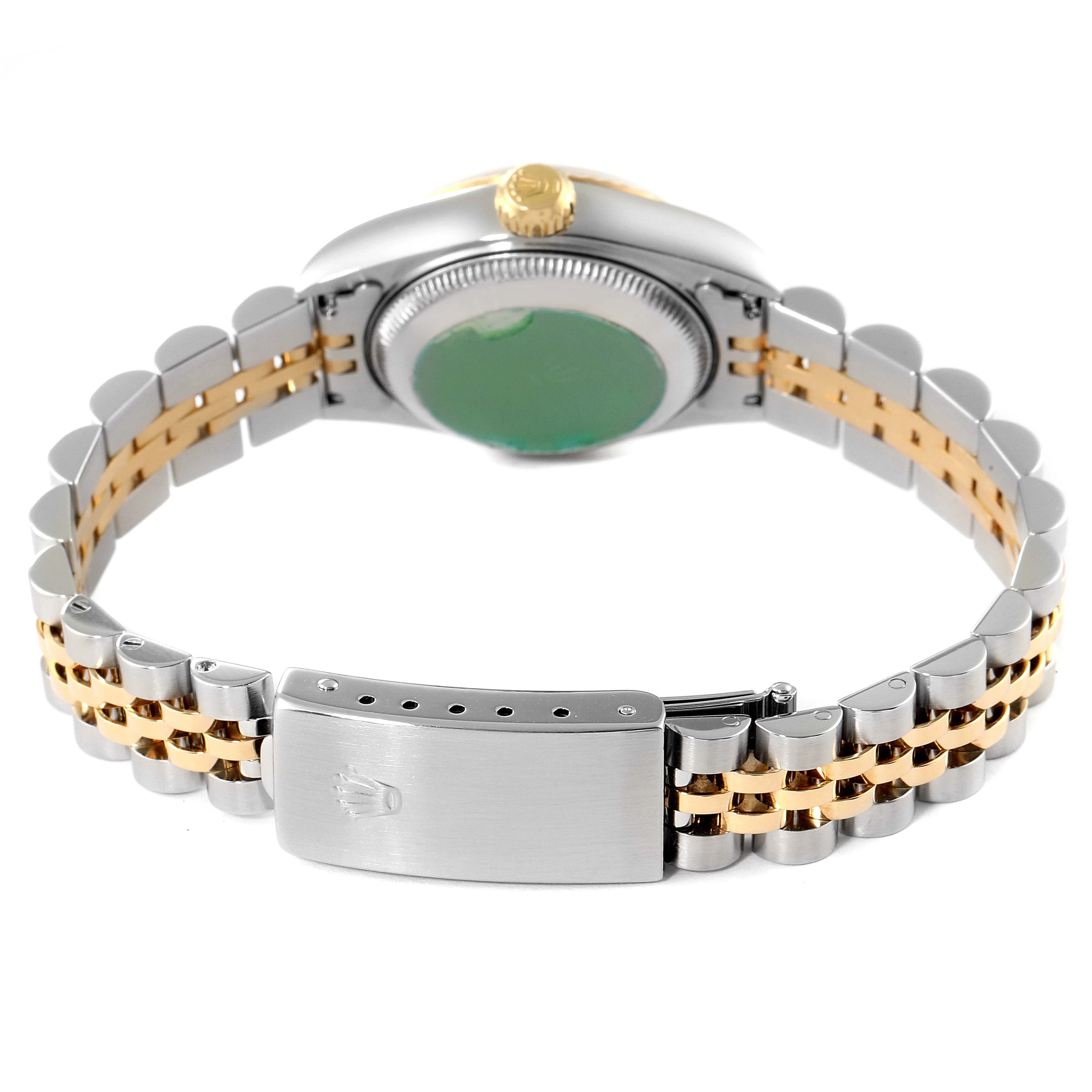 The image shows the backside of the Rolex Datejust 79173 Women's Steel and Gold (two tone) Purple Dial 79173 Women's Steel and Gold (two tone) Purple Dial watch, highlighting the clasp and two-tone bracelet.