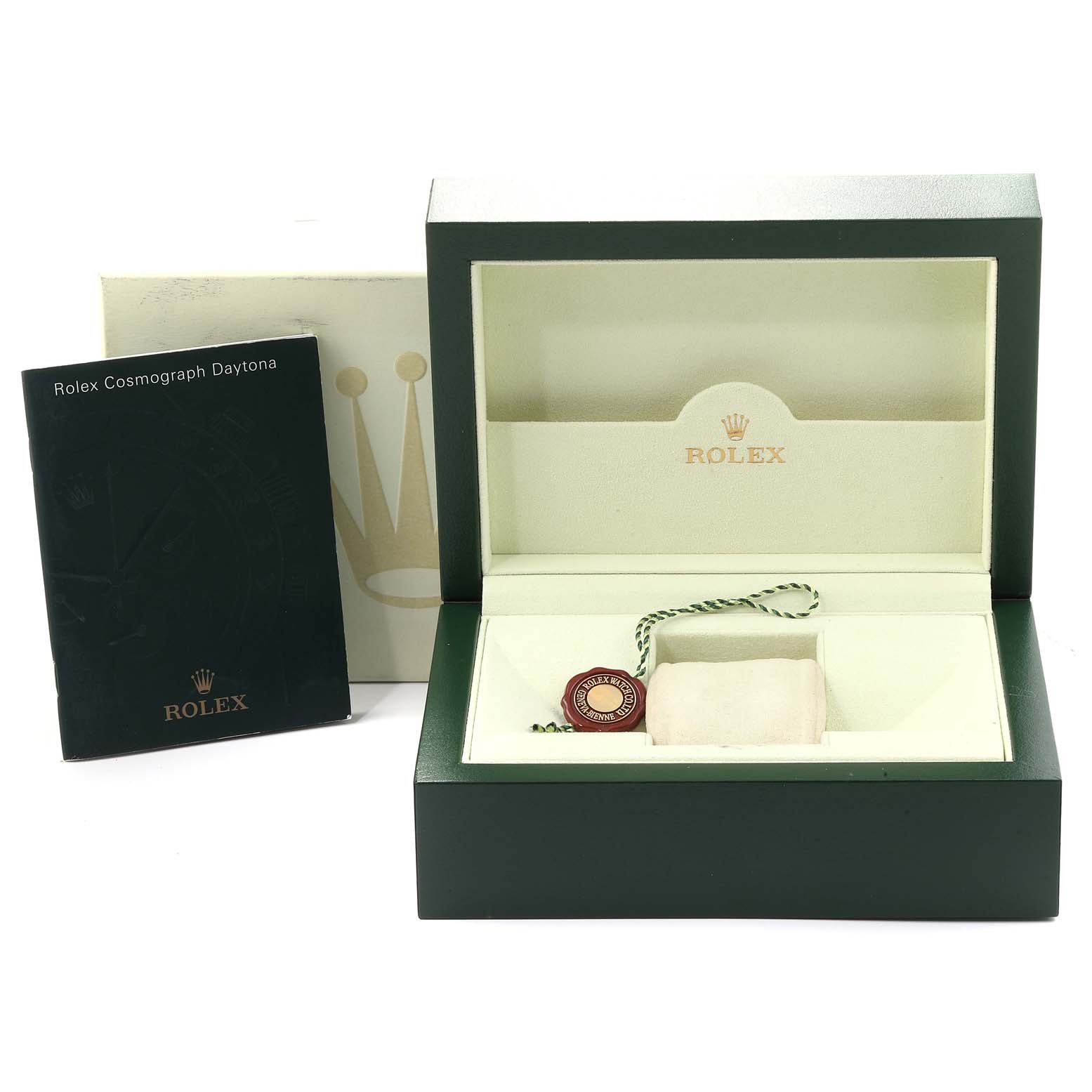 The image shows a Rolex Daytona 116520 Men's Stainless Steel Black Dial 116520 Men's Stainless Steel Black Dial box set with the open watch box, a booklet, and a tag.