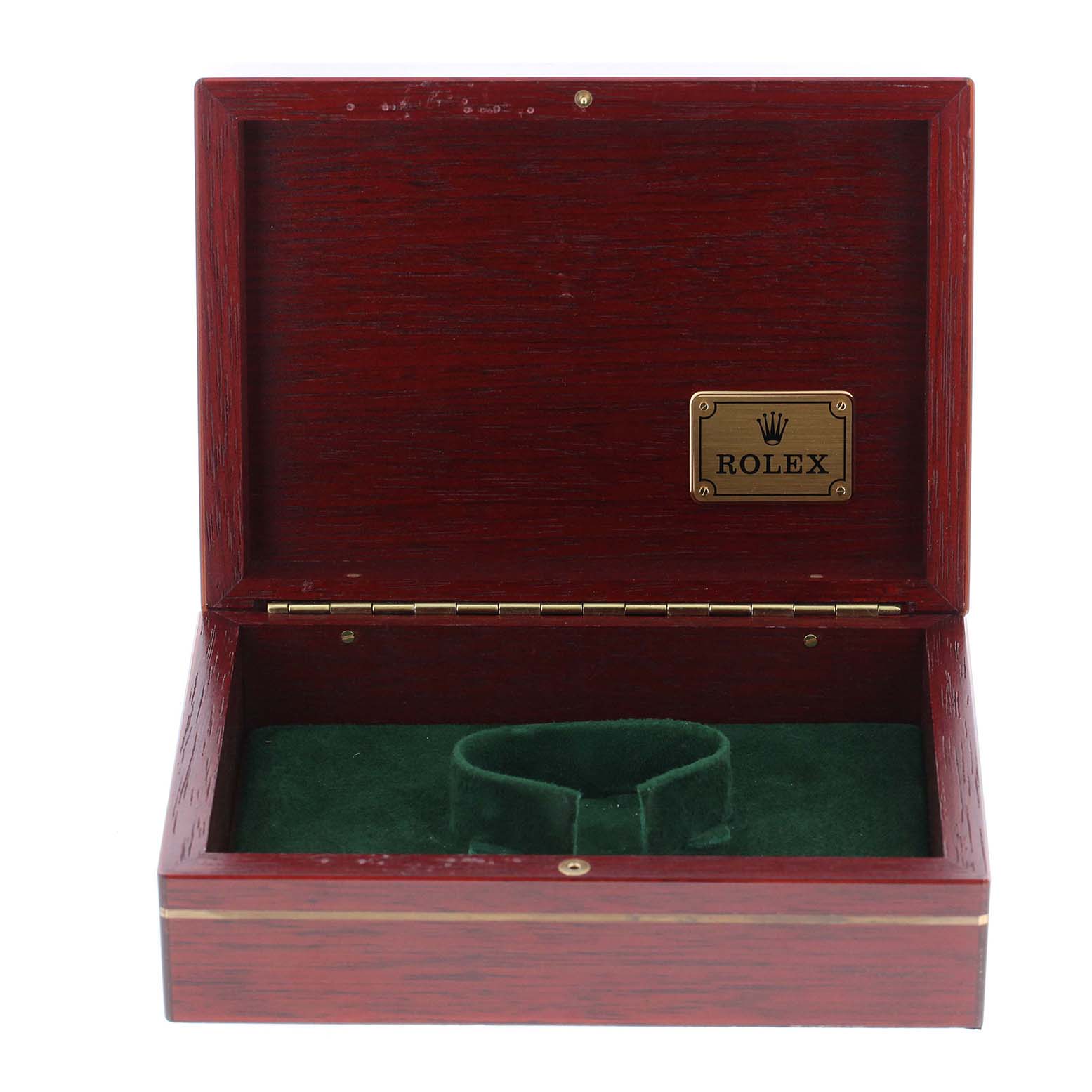 This image shows an open wooden watch box with a green interior, labeled "Rolex," likely for a Daytona model.