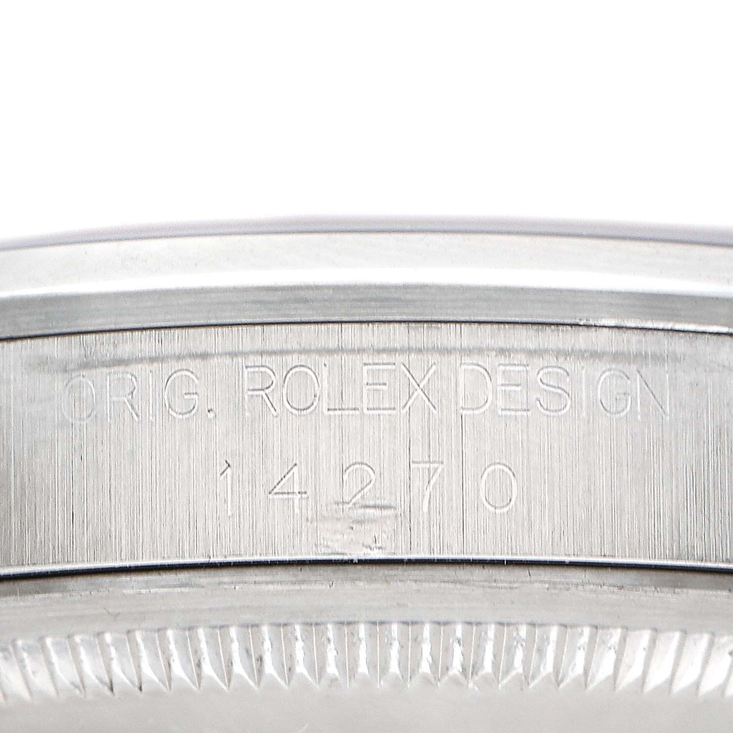 The image shows a close-up of the Rolex Explorer 14270 Men's Stainless Steel Black Dial's side, highlighting the engraved model number and design details.