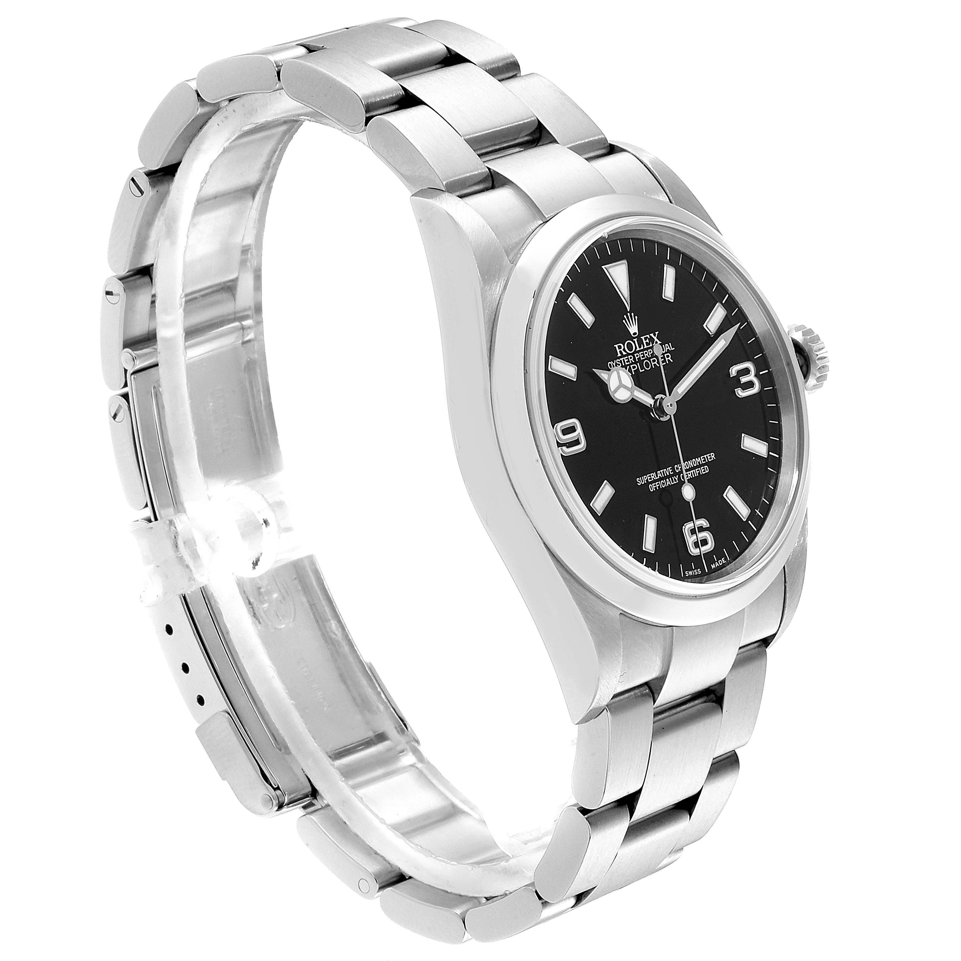 The Rolex Explorer 114270 Men
s Stainless Steel Black Dial 114270 Men
s Stainless Steel Black Dial model watch is shown at a side angle, displaying its face, bezel, crown, and bracelet.