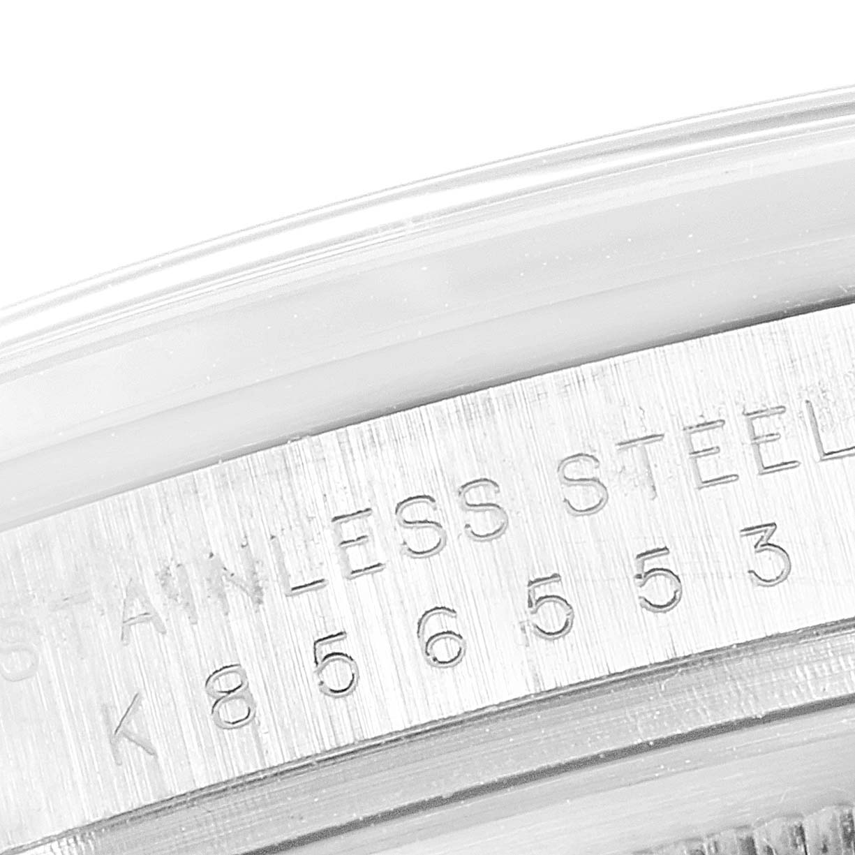 This close-up image shows the engraved stainless steel case back of a Rolex Explorer 114270 Men
s Stainless Steel Black Dial 114270 Men
s Stainless Steel Black Dial watch.