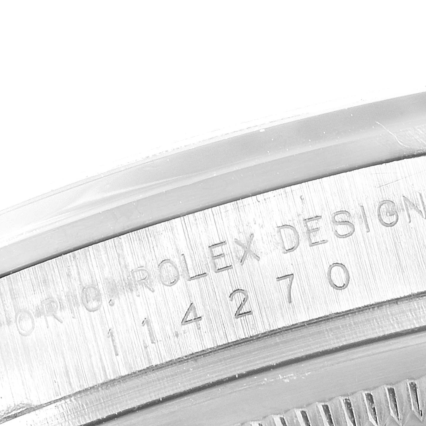 This image shows a close-up view of the case back of a Rolex Explorer 114270 Men
s Stainless Steel Black Dial 114270 Men
s Stainless Steel Black Dial watch, highlighting the engraved model number.