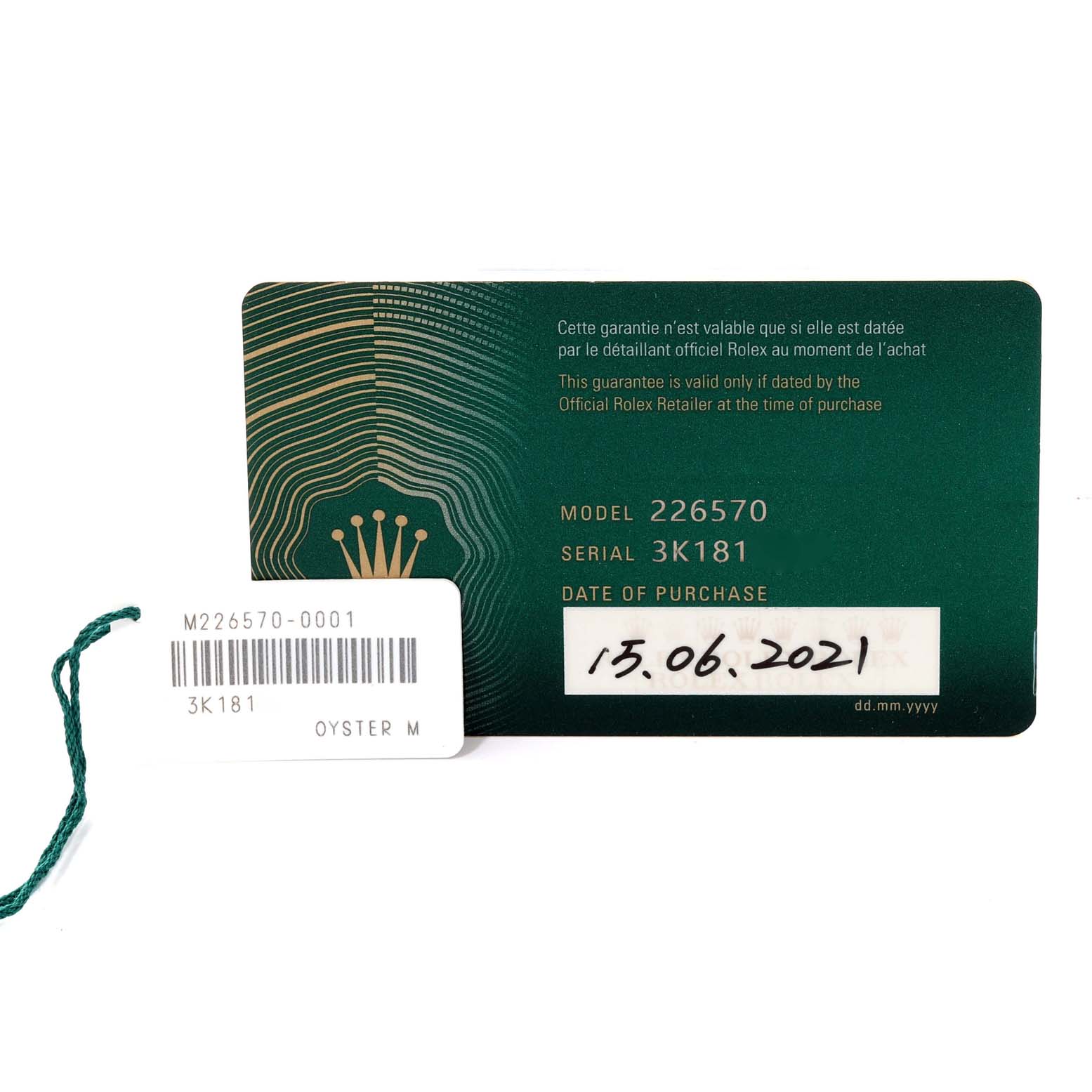 This image shows a warranty card and tag for the Rolex Explorer 226570 Men's Stainless Steel White Dial 226570 Men's Stainless Steel White Dial model 226570, dated 15.06.2021.