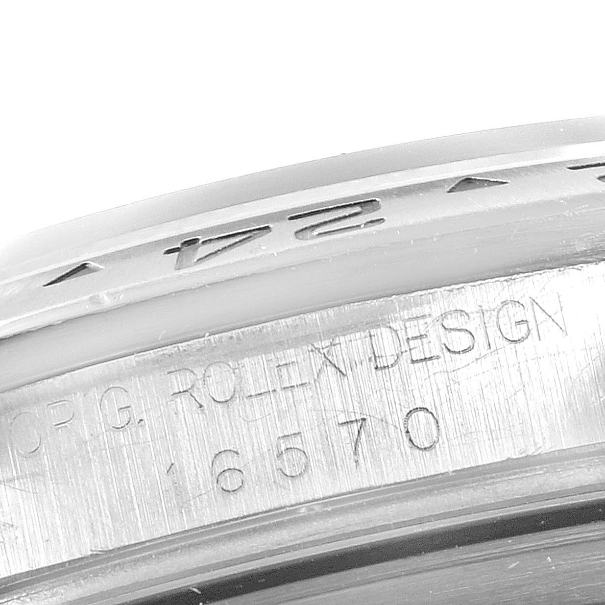 This close-up image shows the engraved model and design numbers on the case of the Rolex Explorer 16570 Men
s Stainless Steel Black Dial 16570 Men
s Stainless Steel Black Dial watch.