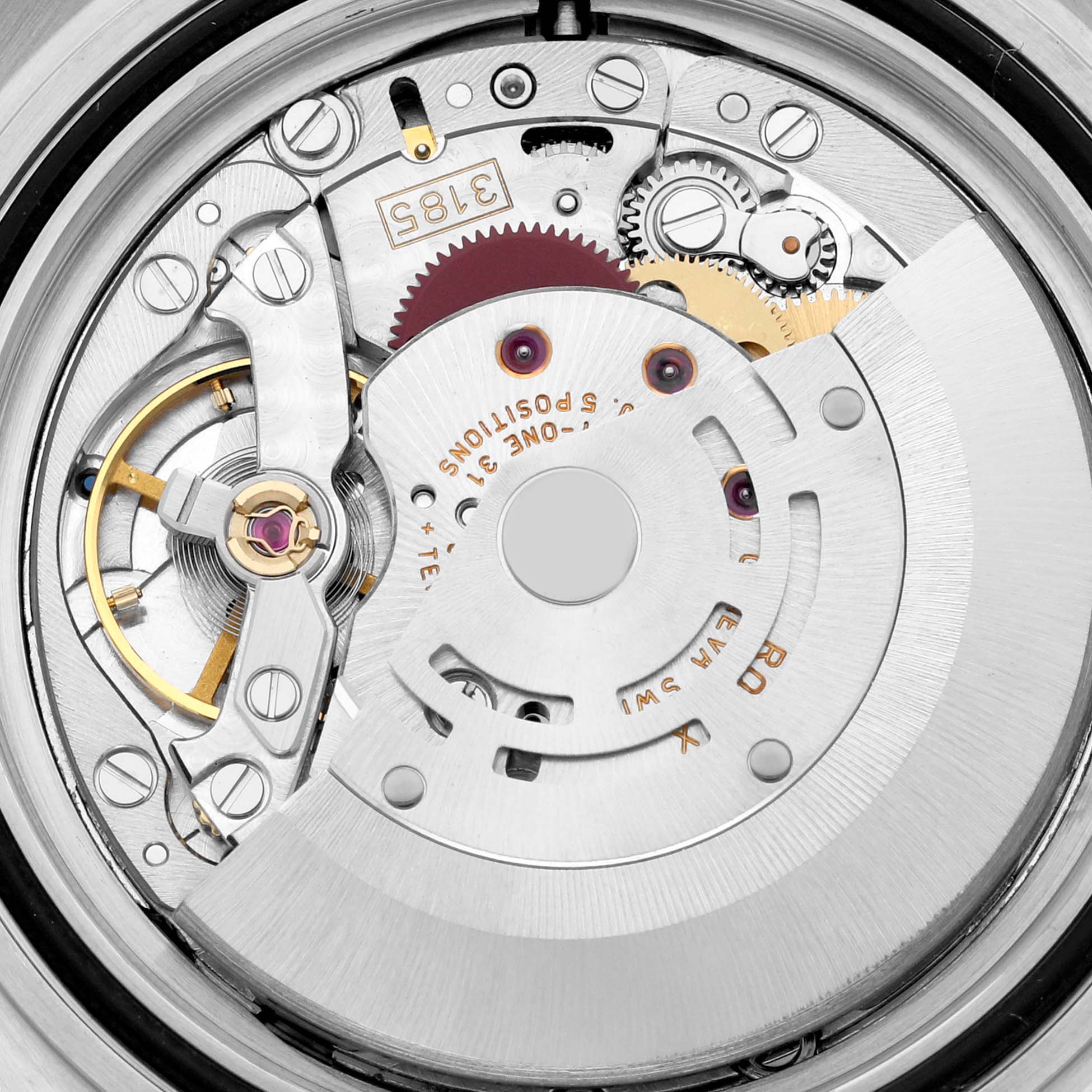 This close-up shows the intricate movement and internal components of a Rolex Explorer 16570 Men
s Stainless Steel Black Dial 16570 Men
s Stainless Steel Black Dial model watch.