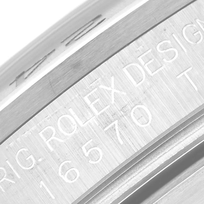 This close-up angle shows the engraved model number and design details on the side of the Rolex Explorer 16570 Men
s Stainless Steel Black Dial 16570 Men
s Stainless Steel Black Dial watch.