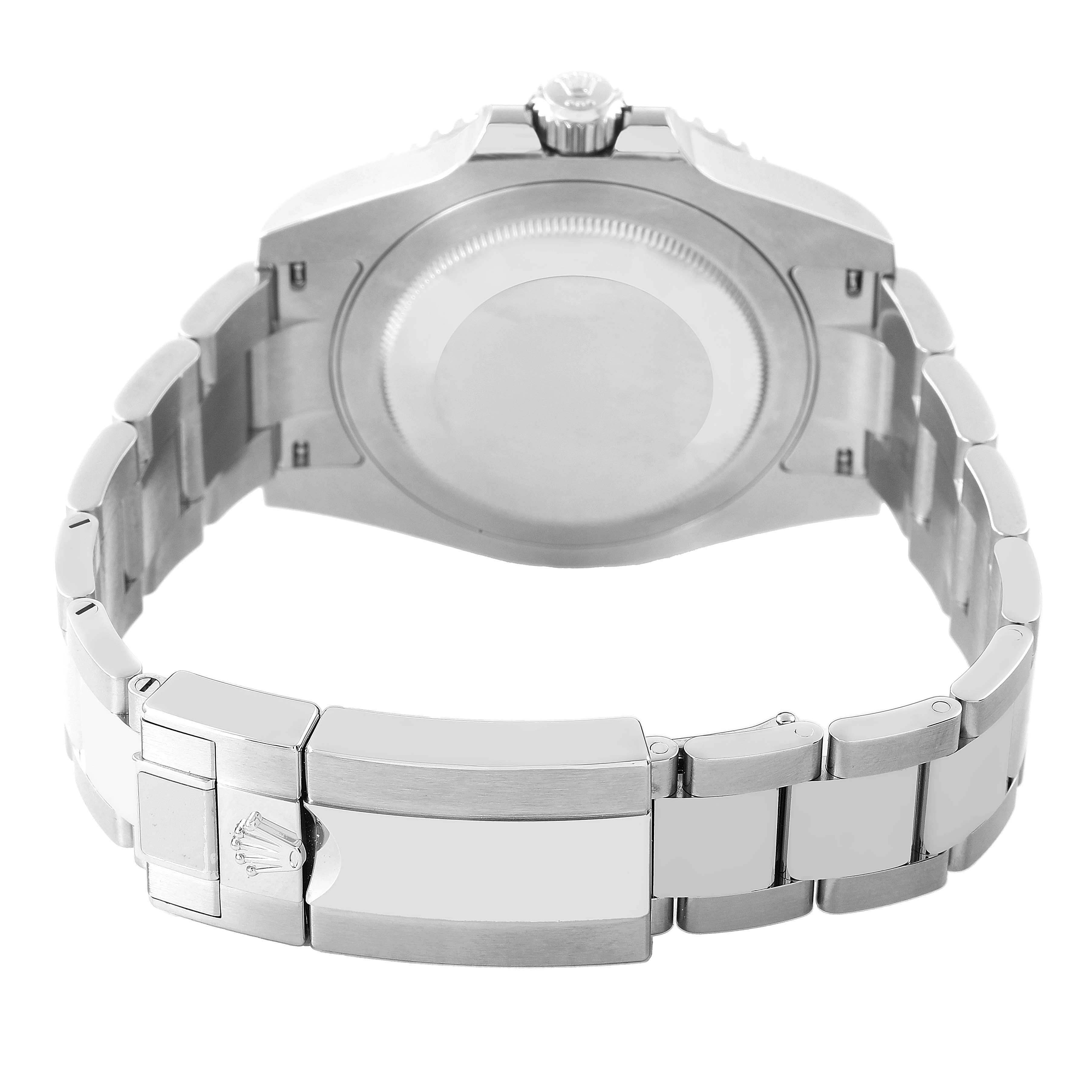 The image shows the back of a Rolex GMT-Master 126710 Men's Stainless Steel Black Dial watch, focusing on the case back and metal bracelet clasp.