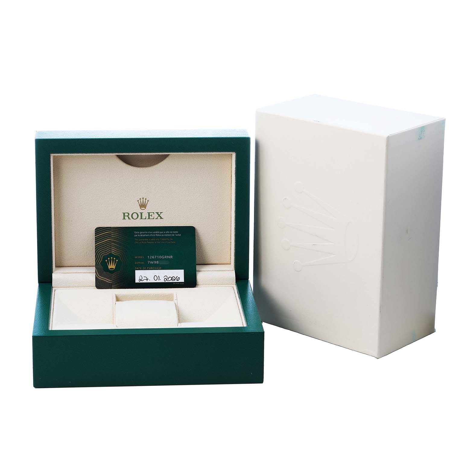 The image shows the packaging of a Rolex GMT-Master 126710 Men's Stainless Steel Black Dial, including the open box and warranty card.