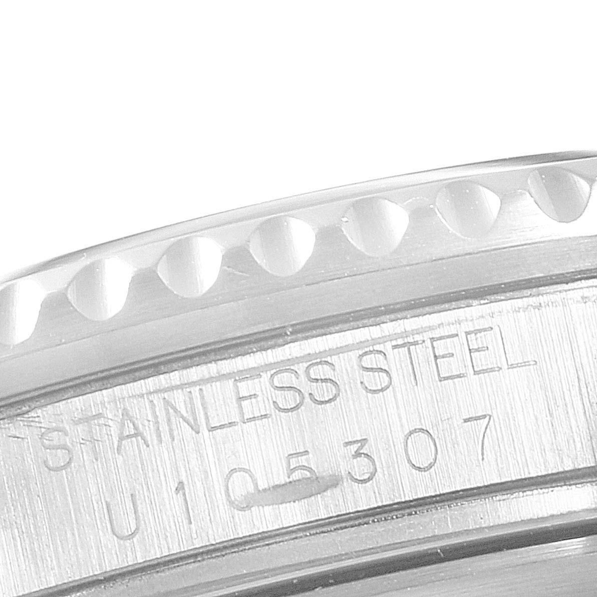 The image shows a close-up of the case side of a Rolex GMT-Master 16710 Men's Stainless Steel Black Dial 16710 Men's Stainless Steel Black Dial watch, highlighting the bezel and the "STAINLESS STEEL" engraving.