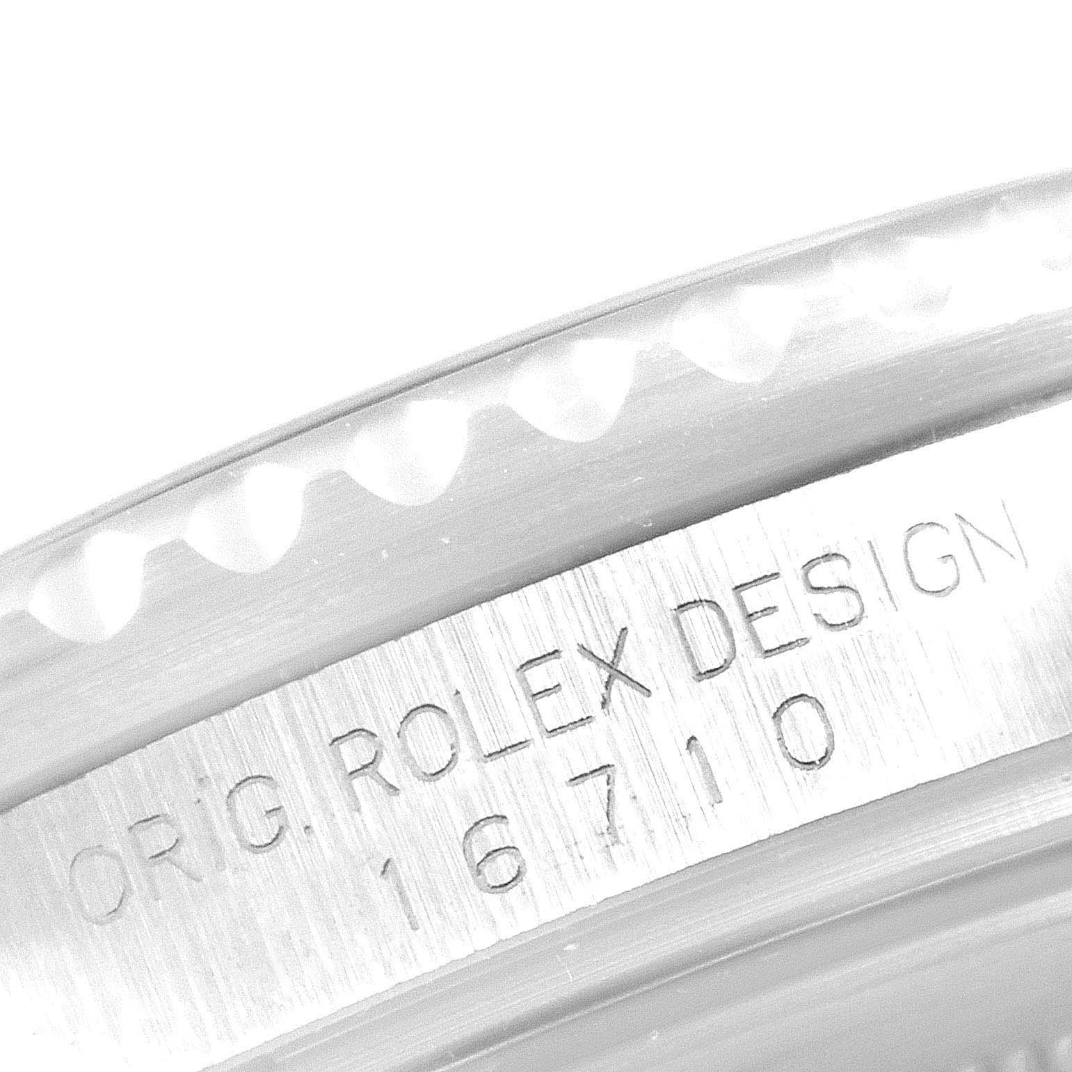 The image shows a close-up angle of the bezel and case side of a Rolex GMT-Master 16710 Men's Stainless Steel Black Dial 16710 Men's Stainless Steel Black Dial with the model number 16710 engraved.