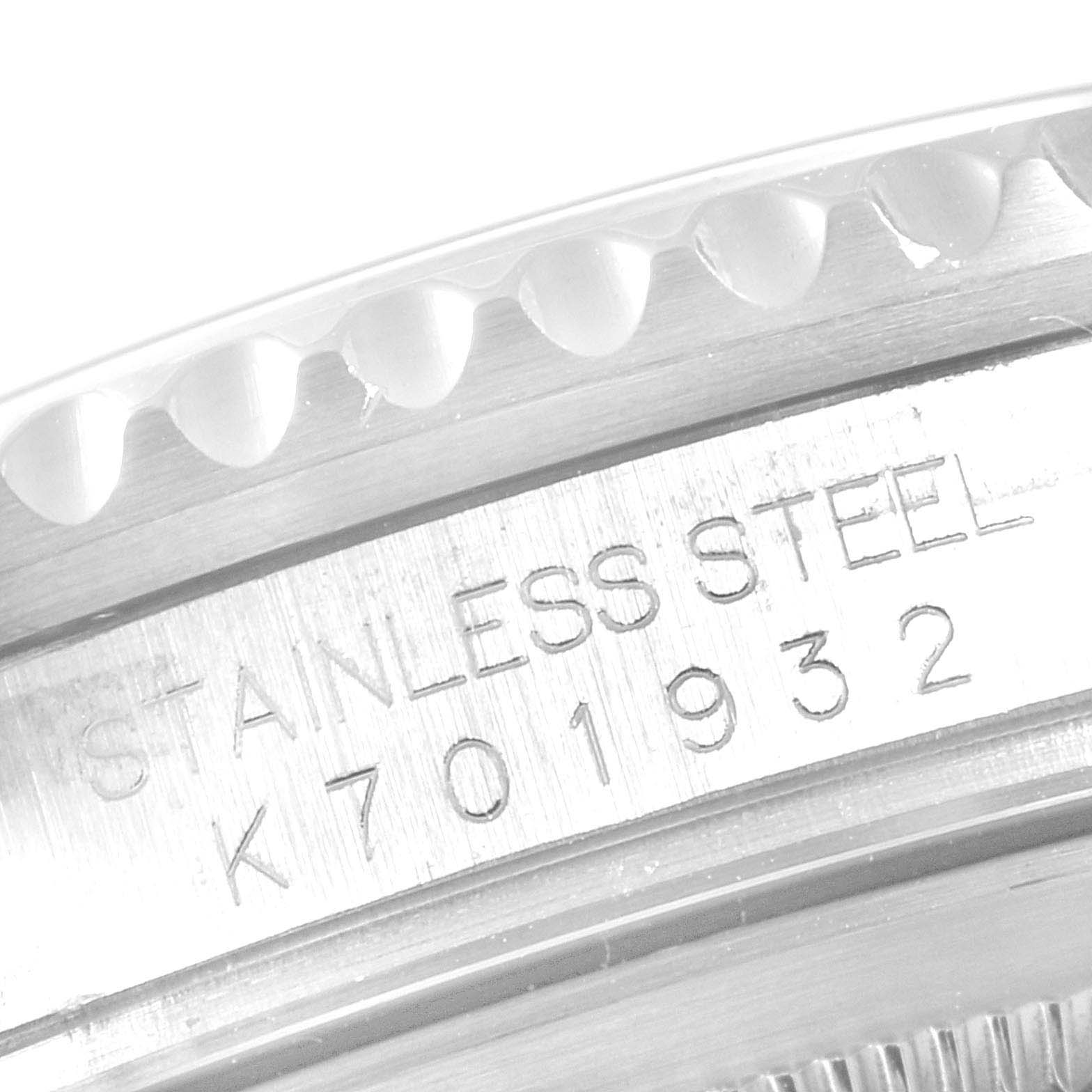 The image shows a close-up of the engraved stainless steel case back of a Rolex GMT-Master 16710 Men's Stainless Steel Black Dial 16710 Men's Stainless Steel Black Dial watch.