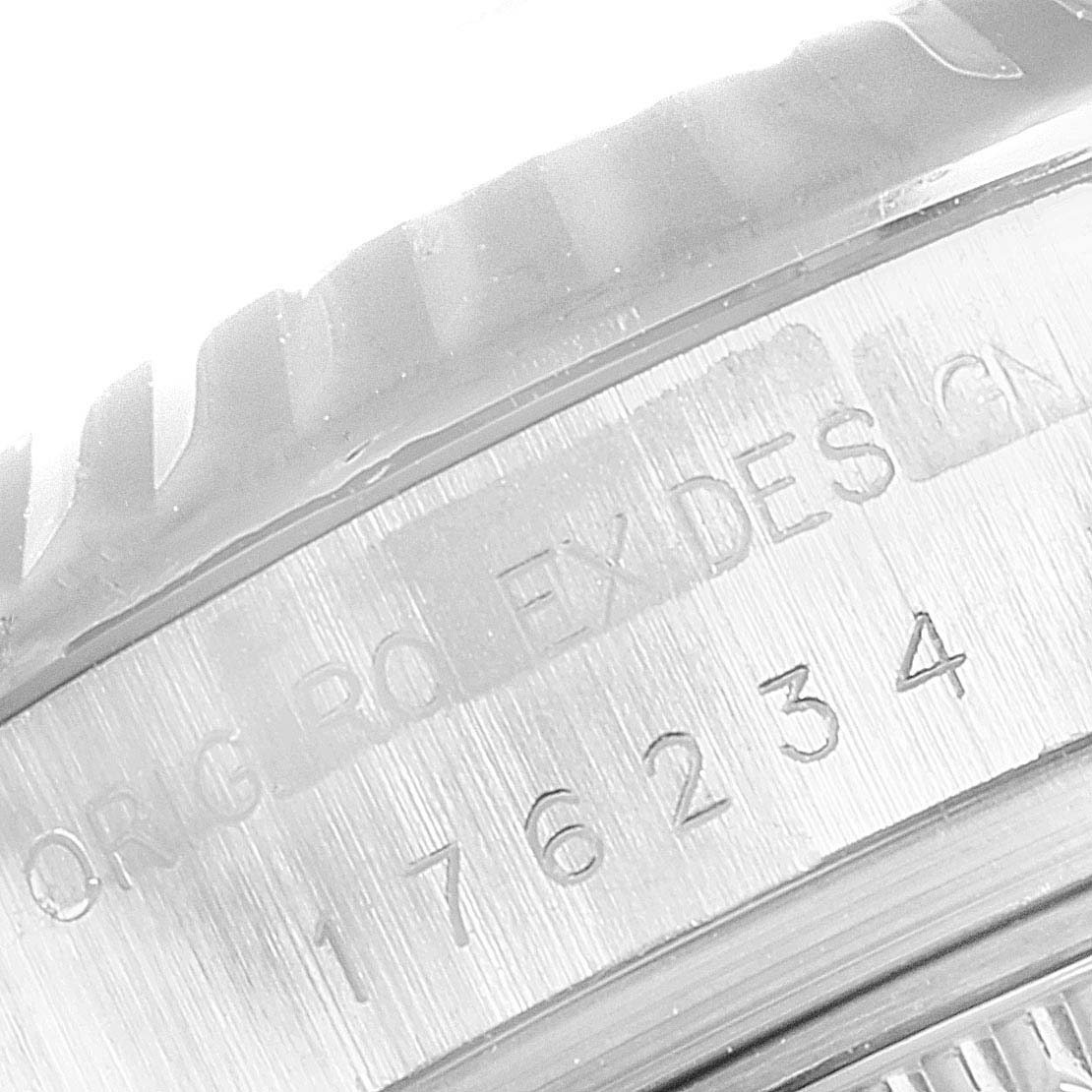 The image shows a close-up of the bezel and the engraved serial number on a Rolex Oyster Perpetual 176234 Women
s Stainless Steel Black Dial 176234 Women
s Stainless Steel Black Dial watch.