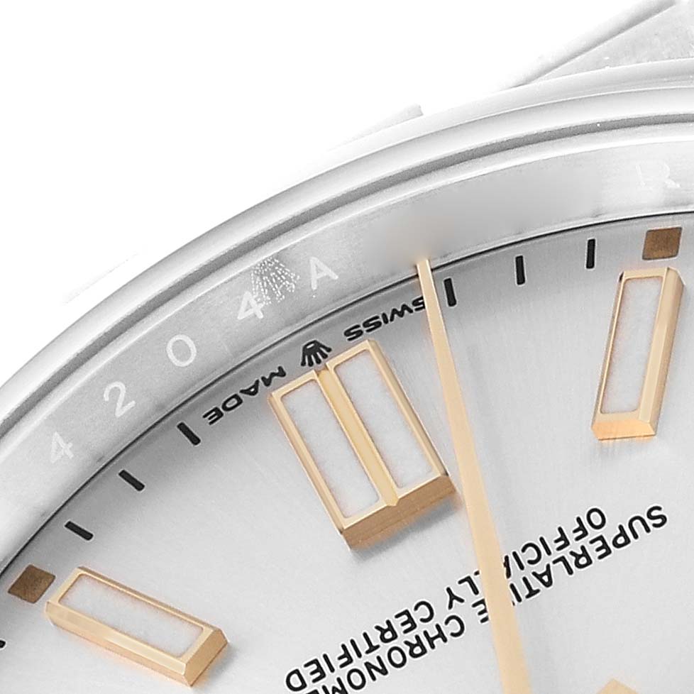 The image shows a close-up of the dial and bezel of a Rolex Oyster Perpetual 124300 Men's Stainless Steel Silver Dial 124300 Men's Stainless Steel Silver Dial watch.