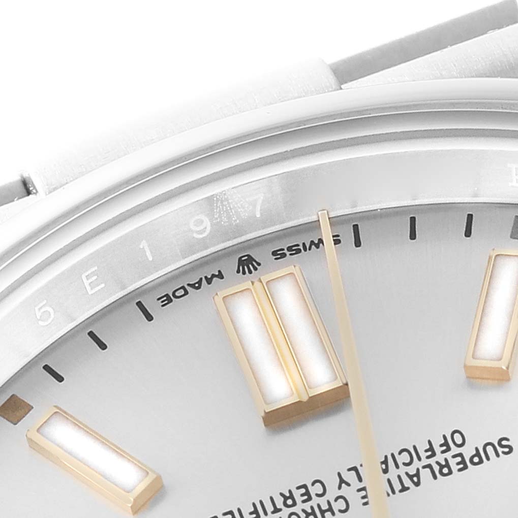 The image shows a close-up of the dial and bezel of a Rolex Oyster Perpetual 124300 Men's Stainless Steel Silver Dial 124300 Men's Stainless Steel Silver Dial watch.