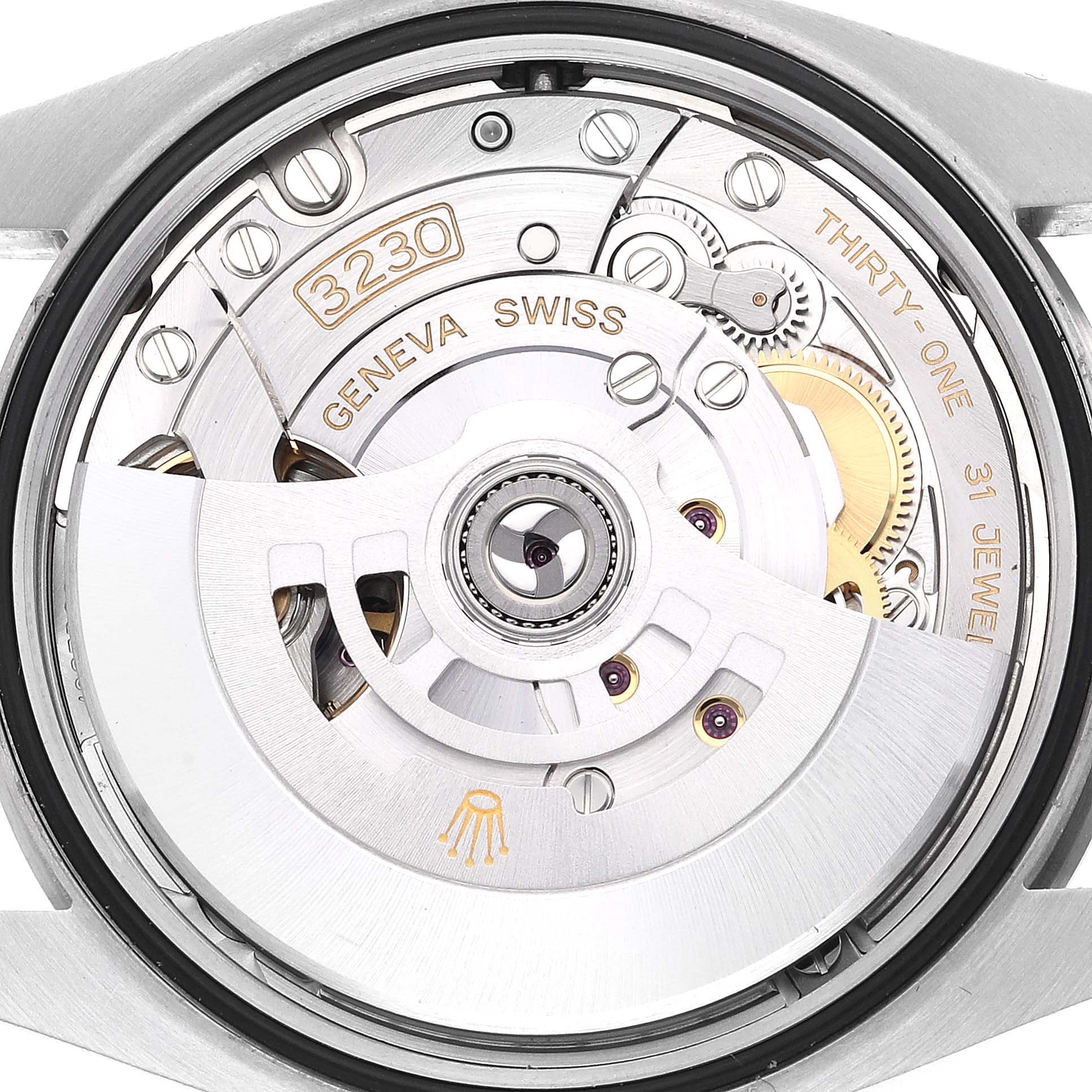 This image shows the internal mechanical movement of a Rolex Oyster Perpetual 126000 Men
s Stainless Steel Black Dial 126000 Men
s Stainless Steel Black Dial watch, highlighting the caliber 3230.