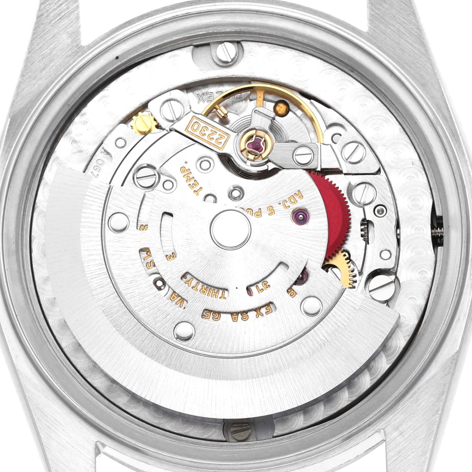 This image shows the inner movement mechanism of a Mid-Size Rolex watch, captured from the back with the case removed.