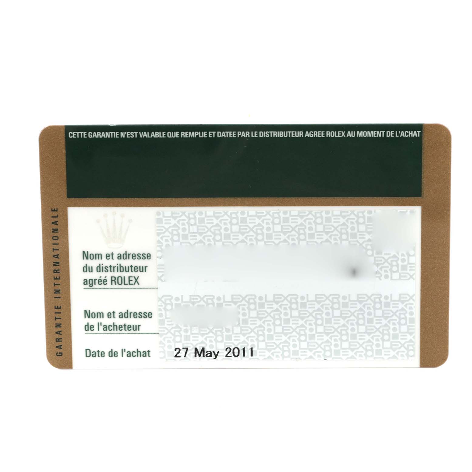 This is a close-up view of the warranty card for a Rolex Mid-Size 77080 Women
s Stainless Steel White Dial 77080 Women
s Stainless Steel White Dial model watch.