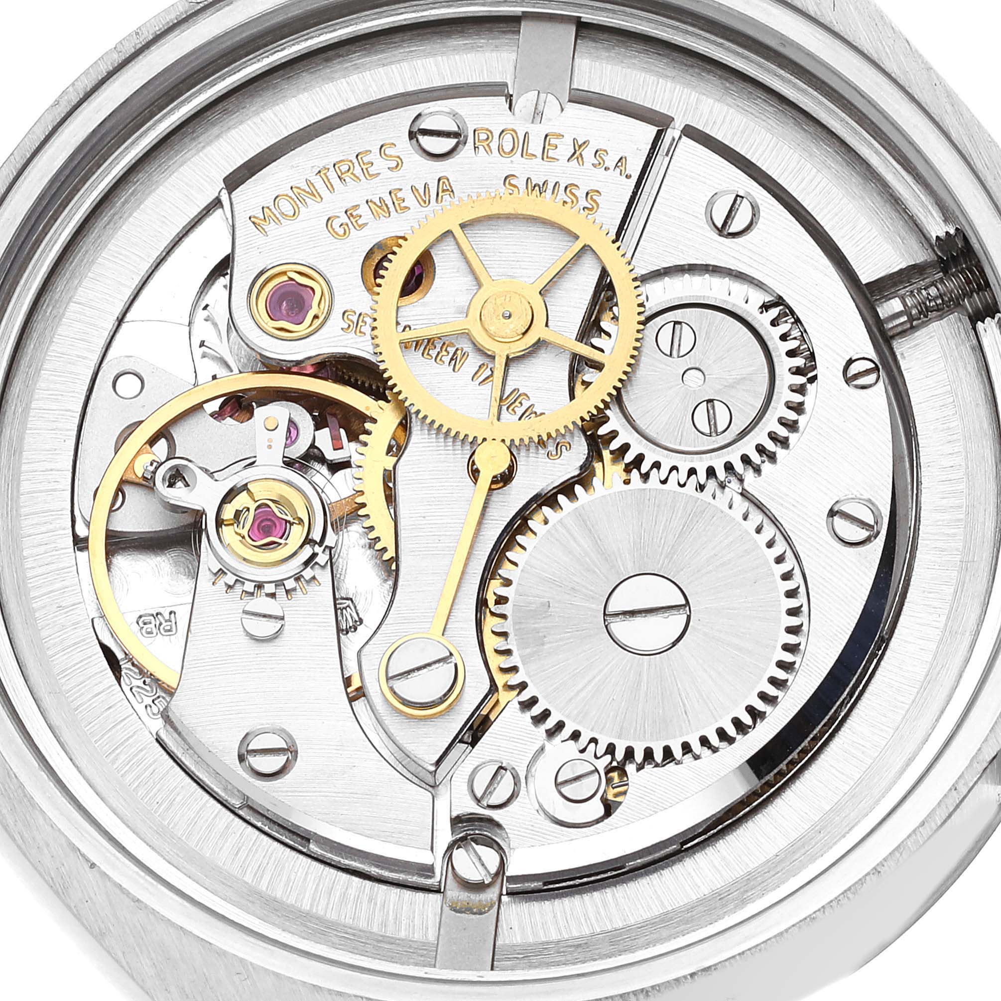 This close-up image shows the intricate inner mechanism of the Vintage Collection Rolex watch.