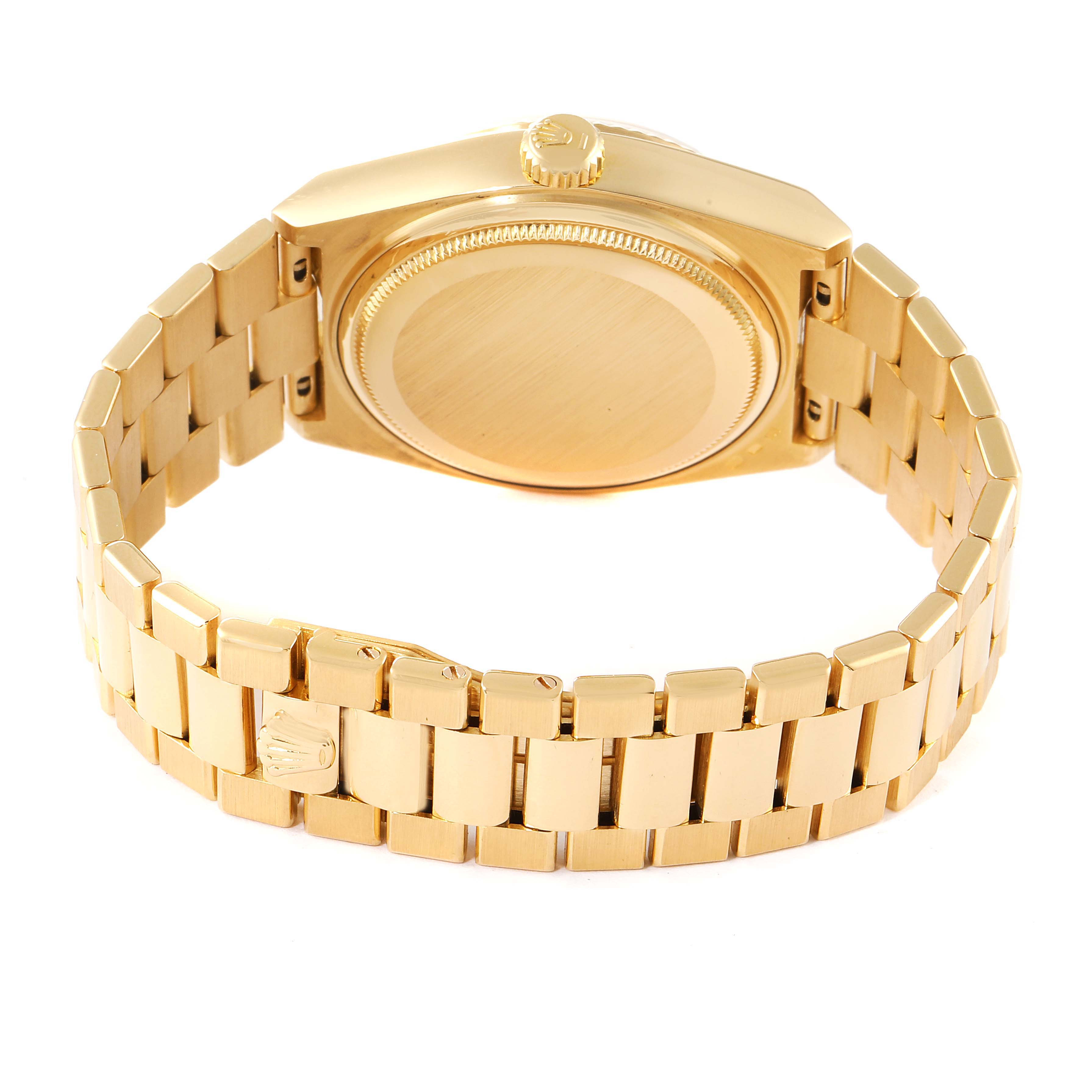 The image shows the back view of the Rolex Oysterquartz 19018 Men's Yellow Gold Champagne Dial 19018 Men's Yellow Gold Champagne Dial watch, focusing on its gold case and bracelet.