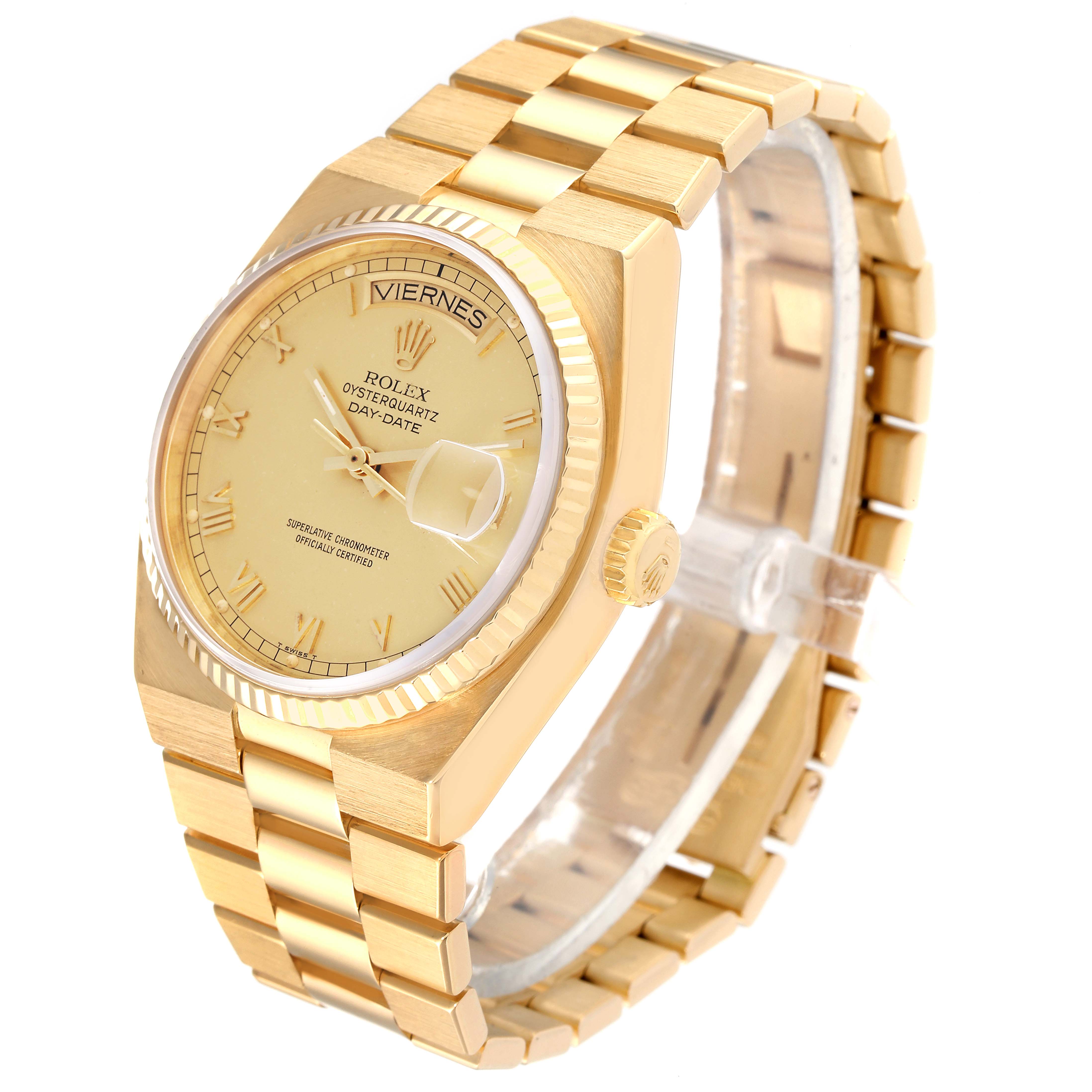 This image shows a Rolex Oysterquartz 19018 Men's Yellow Gold Champagne Dial 19018 Men's Yellow Gold Champagne Dial watch at a slight angle, highlighting its gold-tone case, bracelet, and dial with a day-date display.