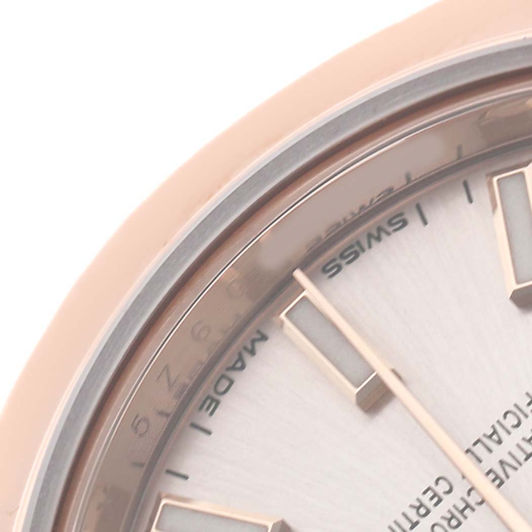 The image shows a close-up of the upper-right corner of the Rolex President 279165 Women's Rose Gold Pink Dial watch's dial, highlighting the hour markers and text.