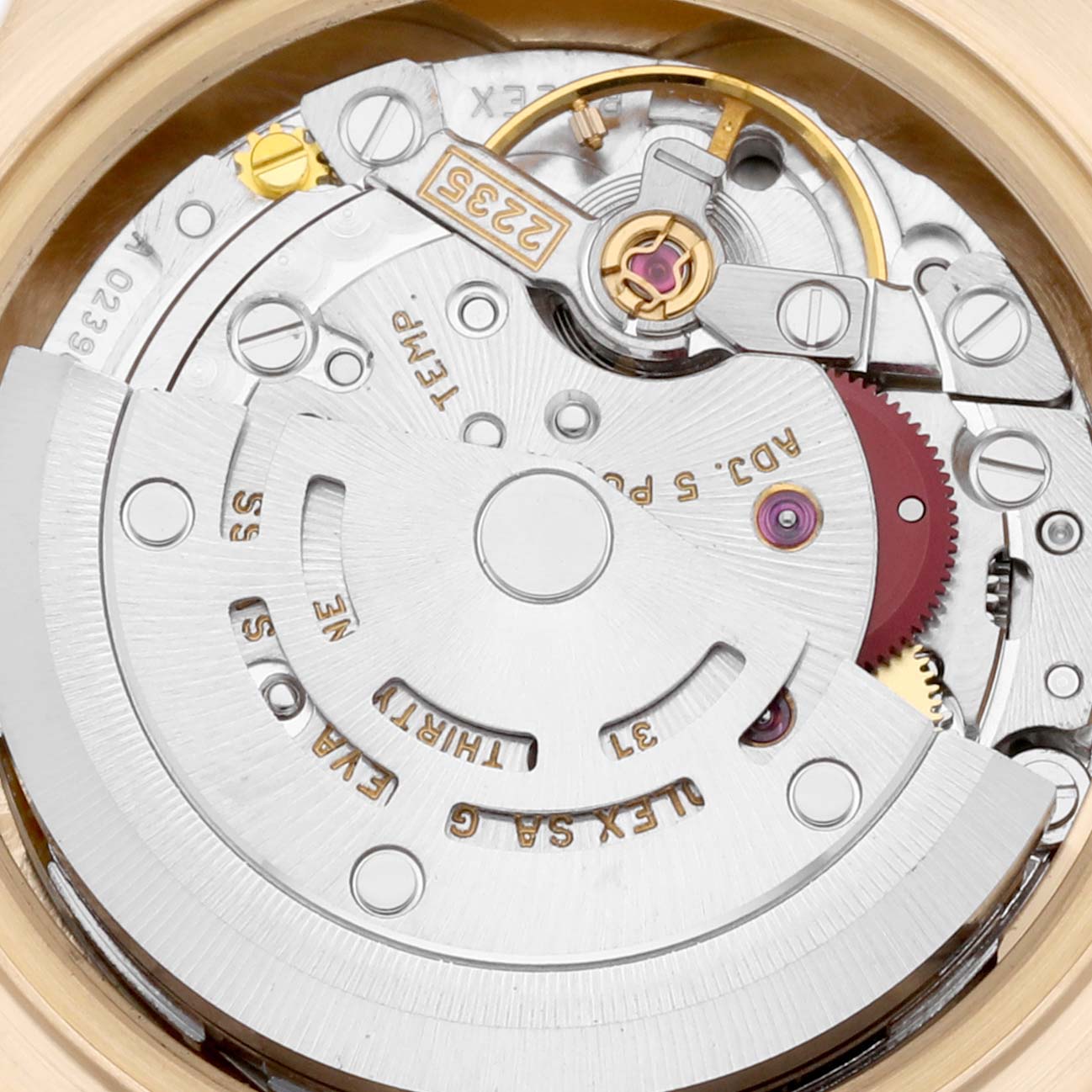 The image shows the inner mechanical movements of a Rolex President 79178 Women's Yellow Gold Blue Dial 79178 Women's Yellow Gold Blue Dial model watch from a close-up angle.