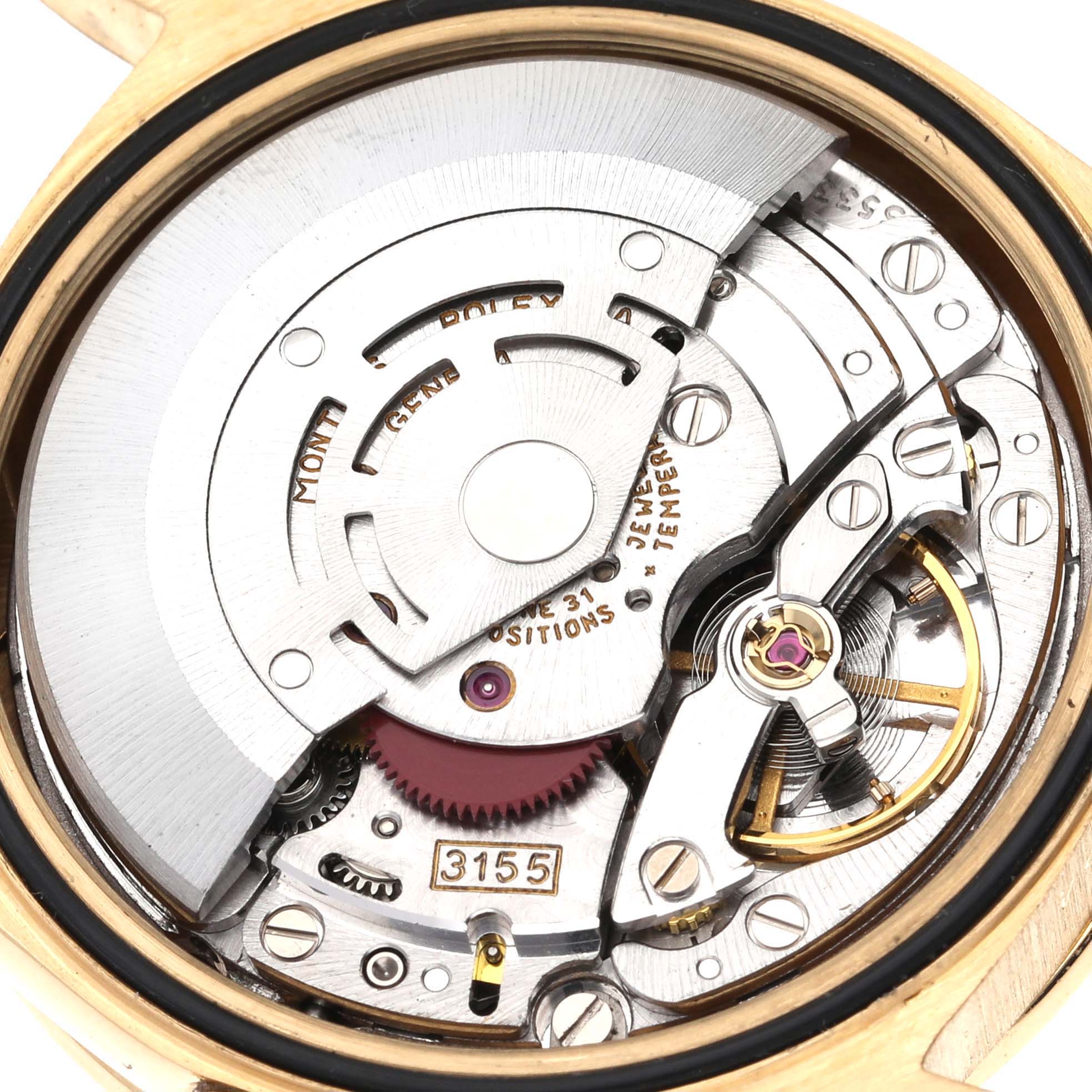 The image shows a close-up view of the movement mechanism of the President model by Rolex.