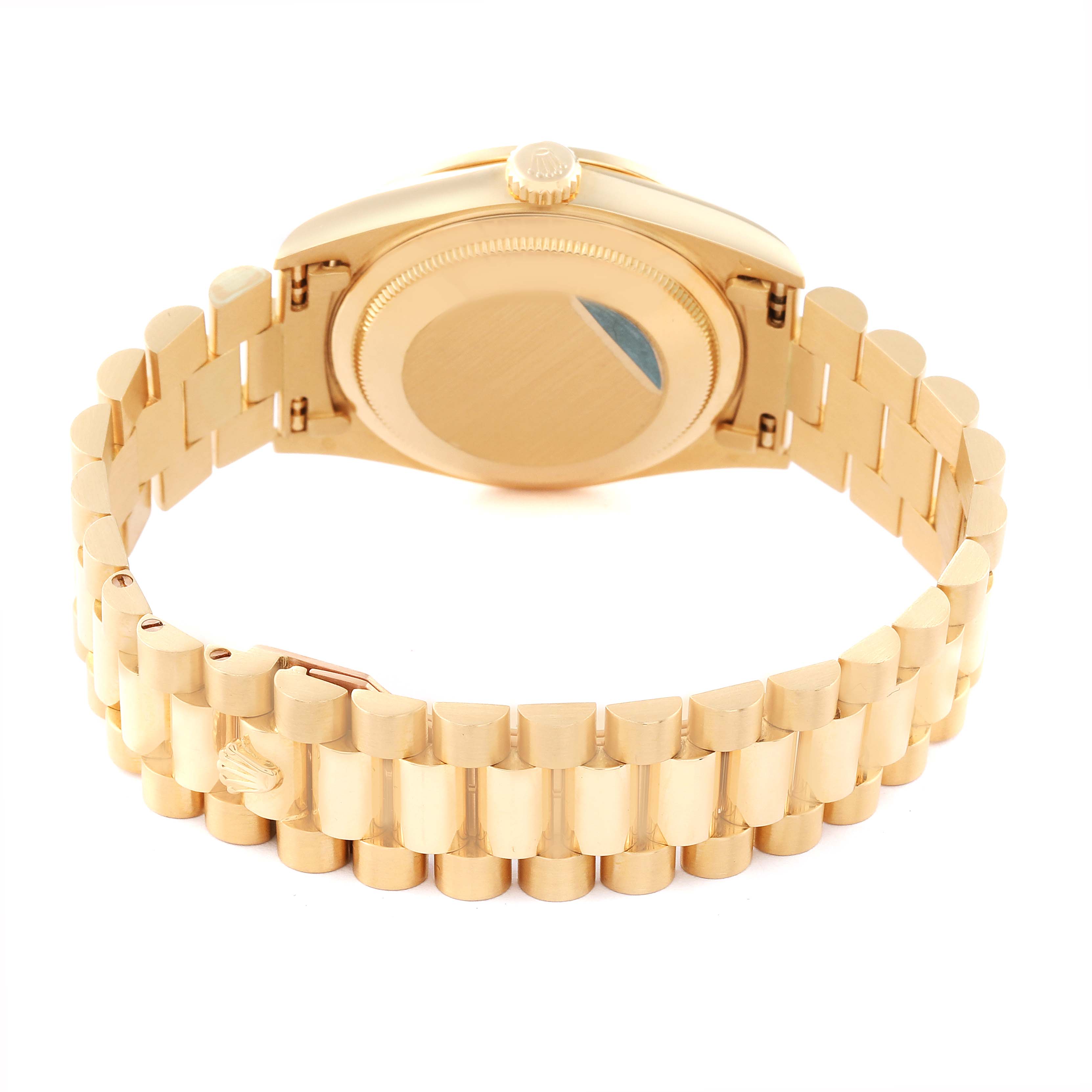 This image shows the back view of a Rolex President 18348 Men
s Yellow Gold Champagne Dial 18348 Men
s Yellow Gold Champagne Dial model watch, highlighting the case back and bracelet.