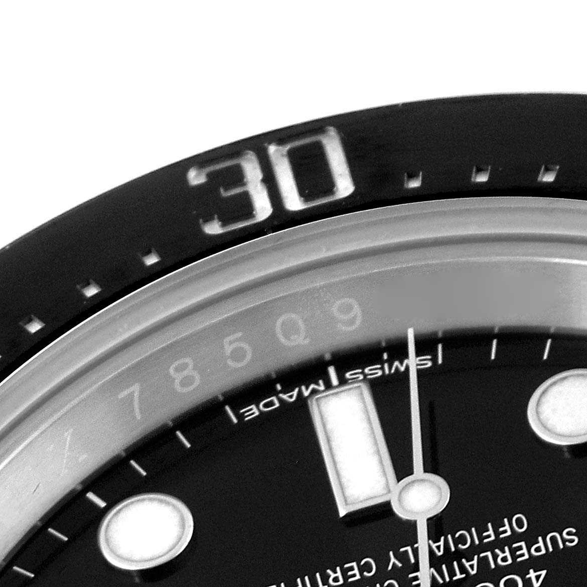 The image shows a close-up of the bezel, dial, and part of the hands of a Rolex Sea-Dweller 126600 Men
s Stainless Steel Black Dial 126600 Men
s Stainless Steel Black Dial watch.
