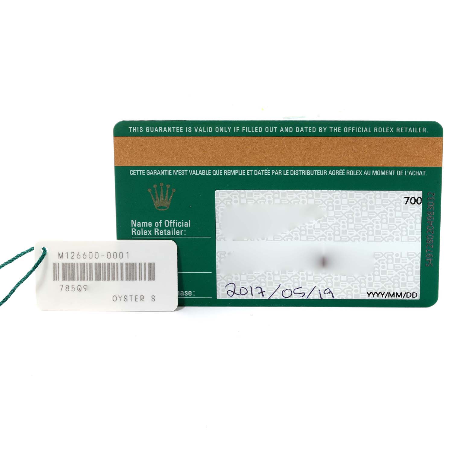 This image shows the warranty card and tag for a Rolex Sea-Dweller 126600 Men
s Stainless Steel Black Dial 126600 Men
s Stainless Steel Black Dial, including the model number and purchase date.