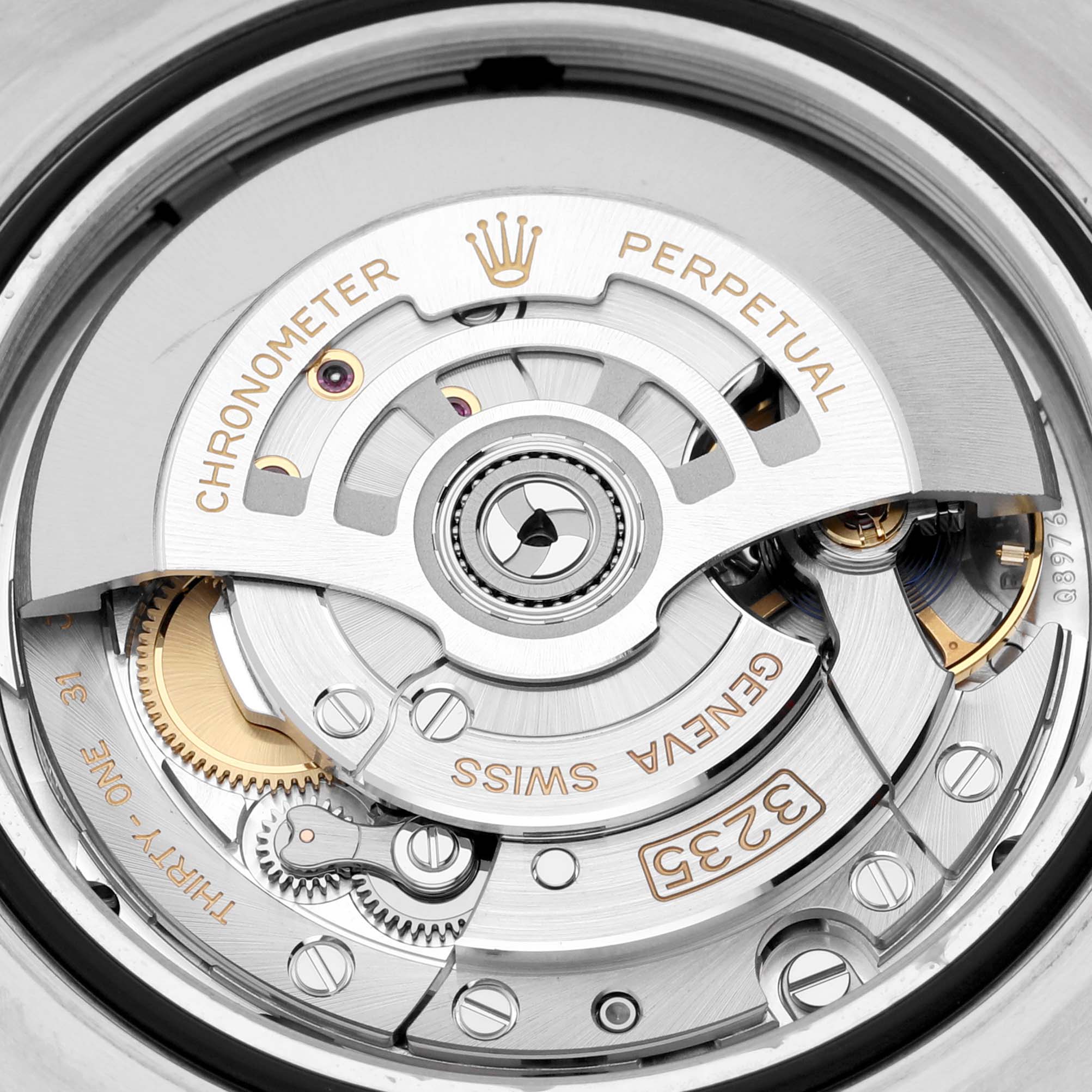 The image shows the intricate inner mechanism of the Rolex Sea-Dweller 126603 Men
s Steel and Gold (two tone) Black Dial 126603 Men
s Steel and Gold (two tone) Black Dial watch model, focusing on the automatic movement components.