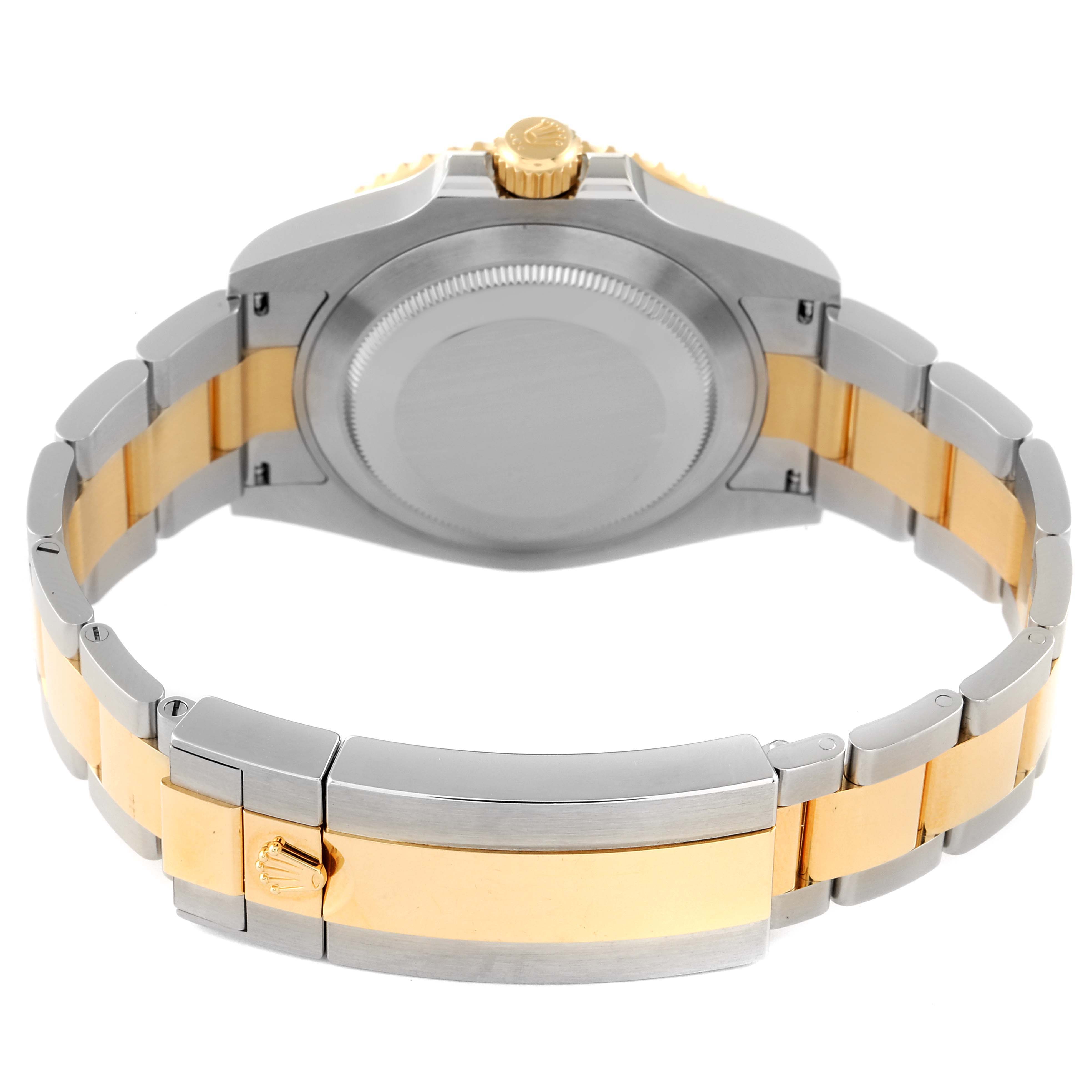 This image shows the back angle of a Rolex Submariner 126613 Men's Steel and Gold (two tone) Blue Dial 126613 Men's Steel and Gold (two tone) Blue Dial, highlighting the case back and two-tone bracelet.