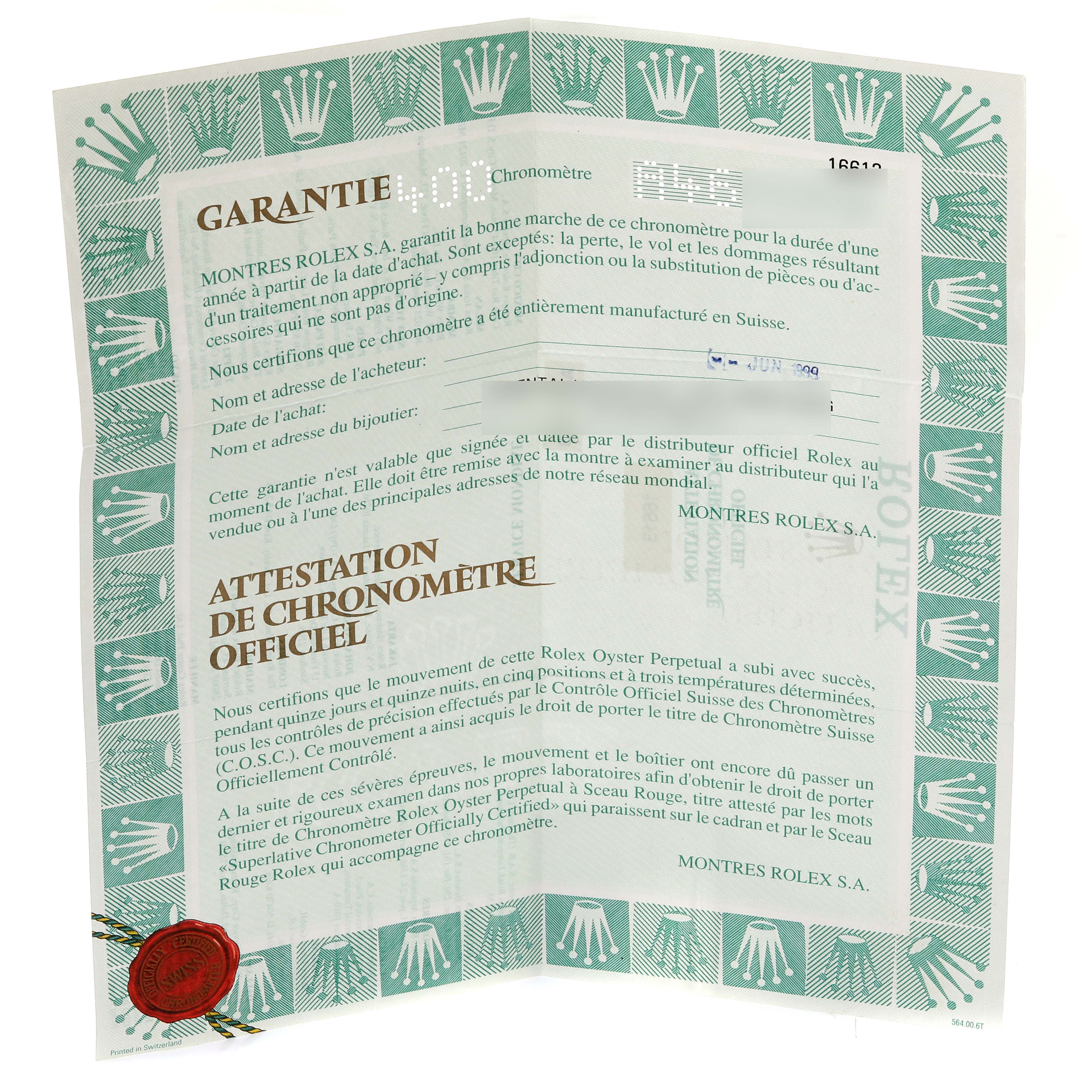 This is a certificate and warranty document for the Rolex Submariner 16613 Men's Steel and Gold (two tone) Blue Dial 16613 Men's Steel and Gold (two tone) Blue Dial watch.