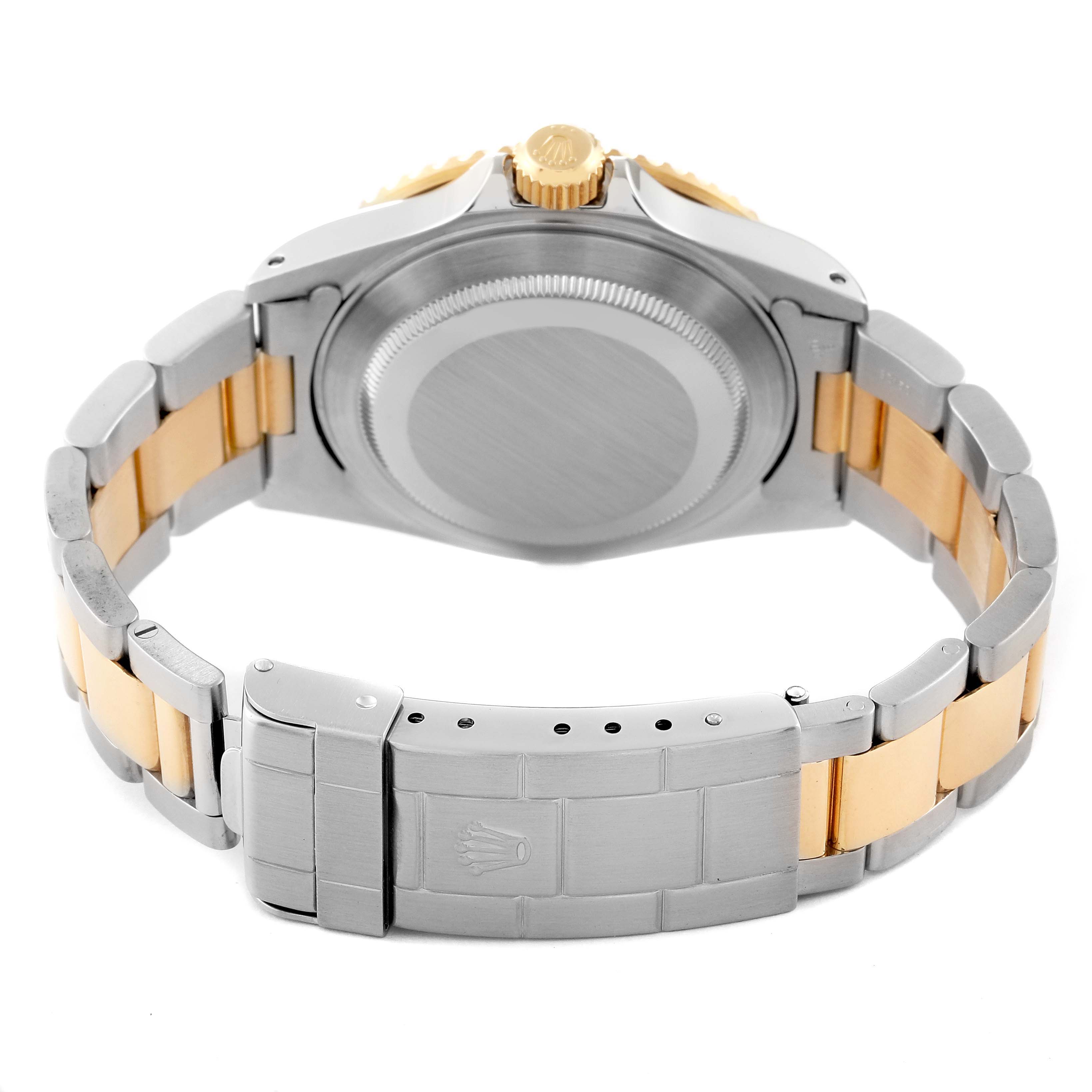 The image shows the back case and bracelet of a Rolex Submariner 16613 Men's Steel and Gold (two tone) Blue Dial 16613 Men's Steel and Gold (two tone) Blue Dial watch, highlighting its two-tone metal design and clasp.