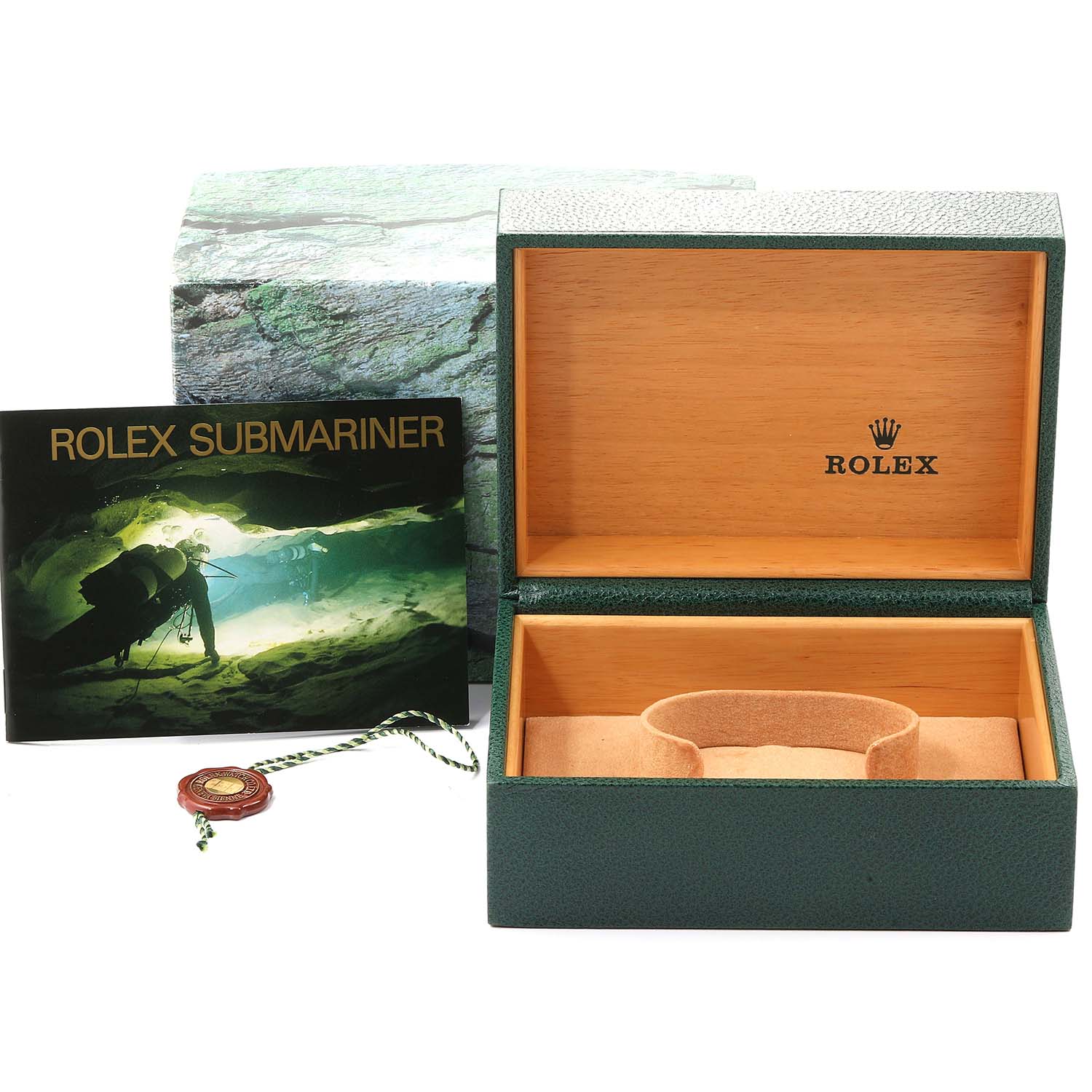 The image shows the open watch box, manual, and a tag for the Rolex Submariner 16610 Men
s Stainless Steel Black Dial 16610 Men
s Stainless Steel Black Dial model.